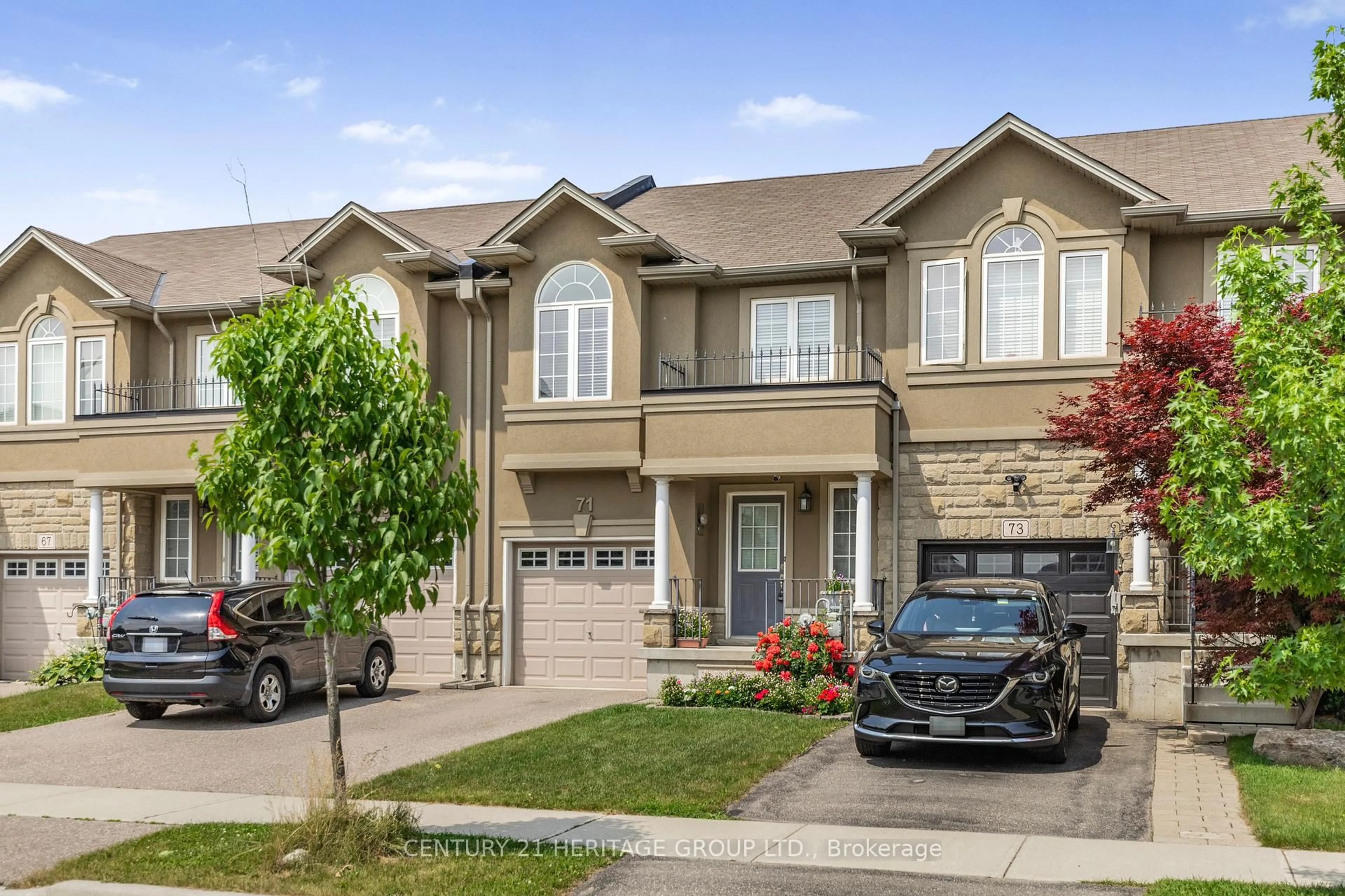 Home with vinyl exterior material, street for 71 Waterbridge St, Hamilton Ontario L8J 0G2