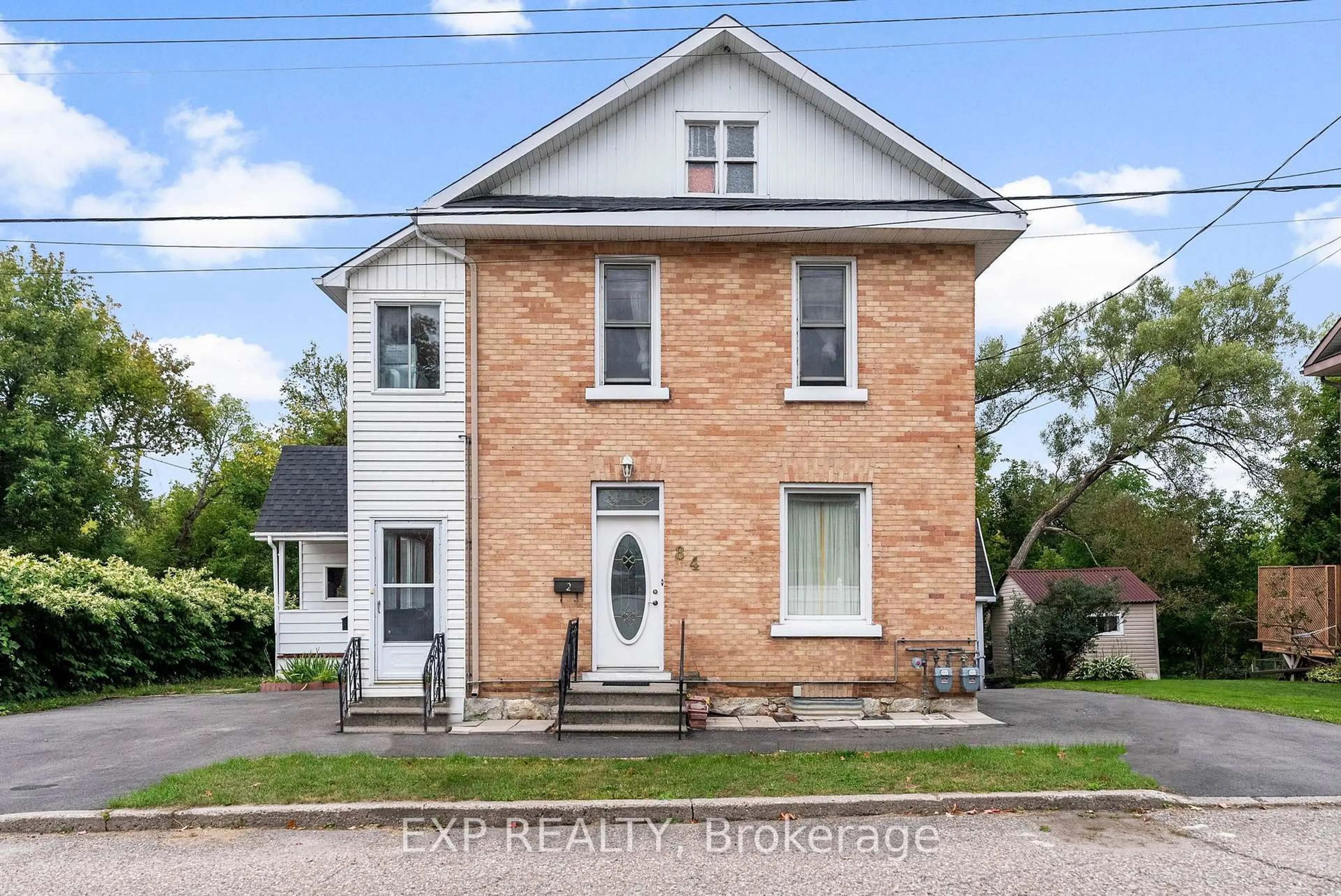Home with brick exterior material, street for 84 Bank St, Renfrew Ontario K7V 2E2