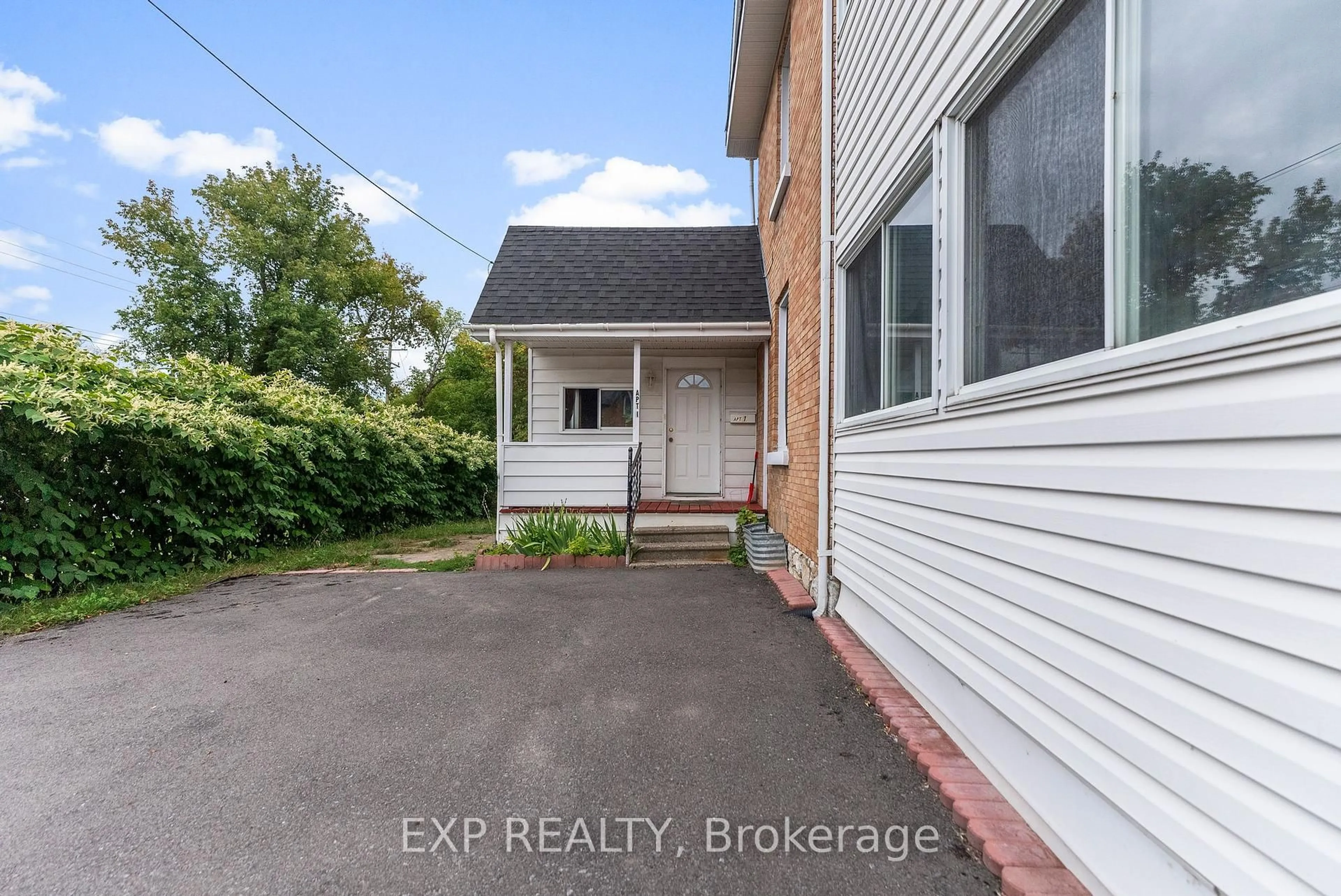 A pic from outside/outdoor area/front of a property/back of a property/a pic from drone, street for 84 Bank St, Renfrew Ontario K7V 2E2