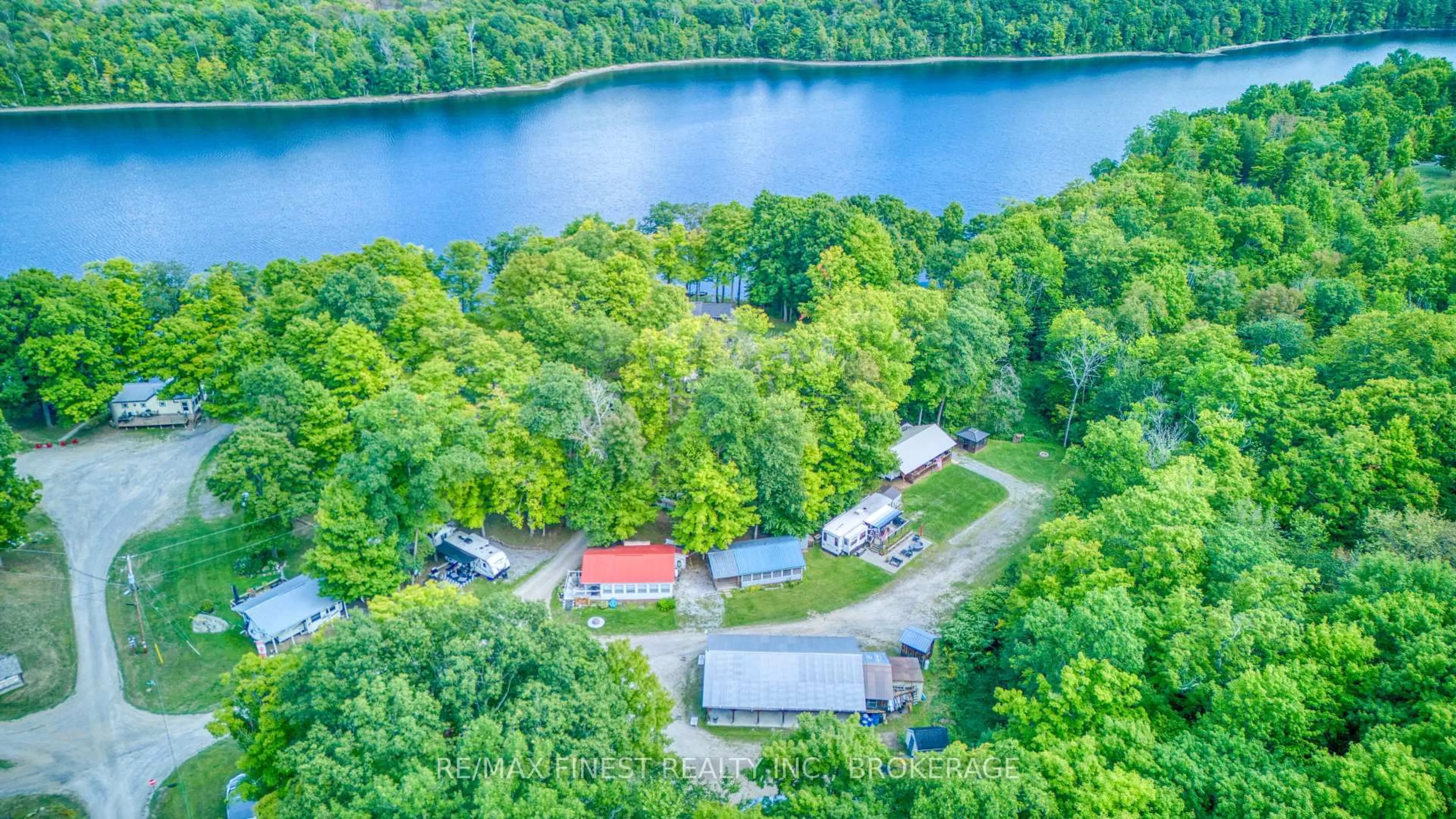 A pic from outside/outdoor area/front of a property/back of a property/a pic from drone, water/lake/river/ocean view for 60C Stinson Lane, Tichborne Ontario K0H 2V0