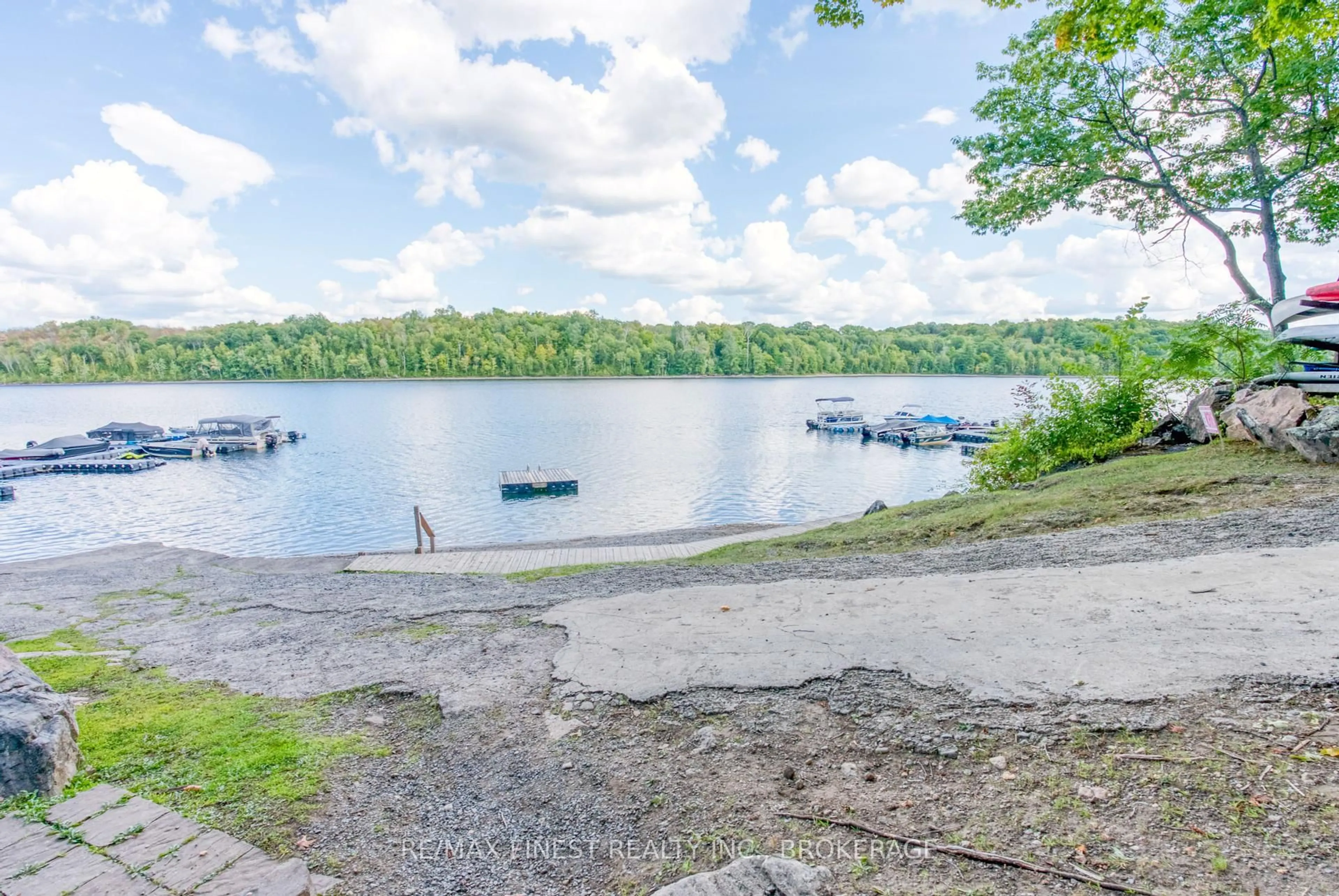 A pic from outside/outdoor area/front of a property/back of a property/a pic from drone, water/lake/river/ocean view for 60C Stinson Lane, Tichborne Ontario K0H 2V0