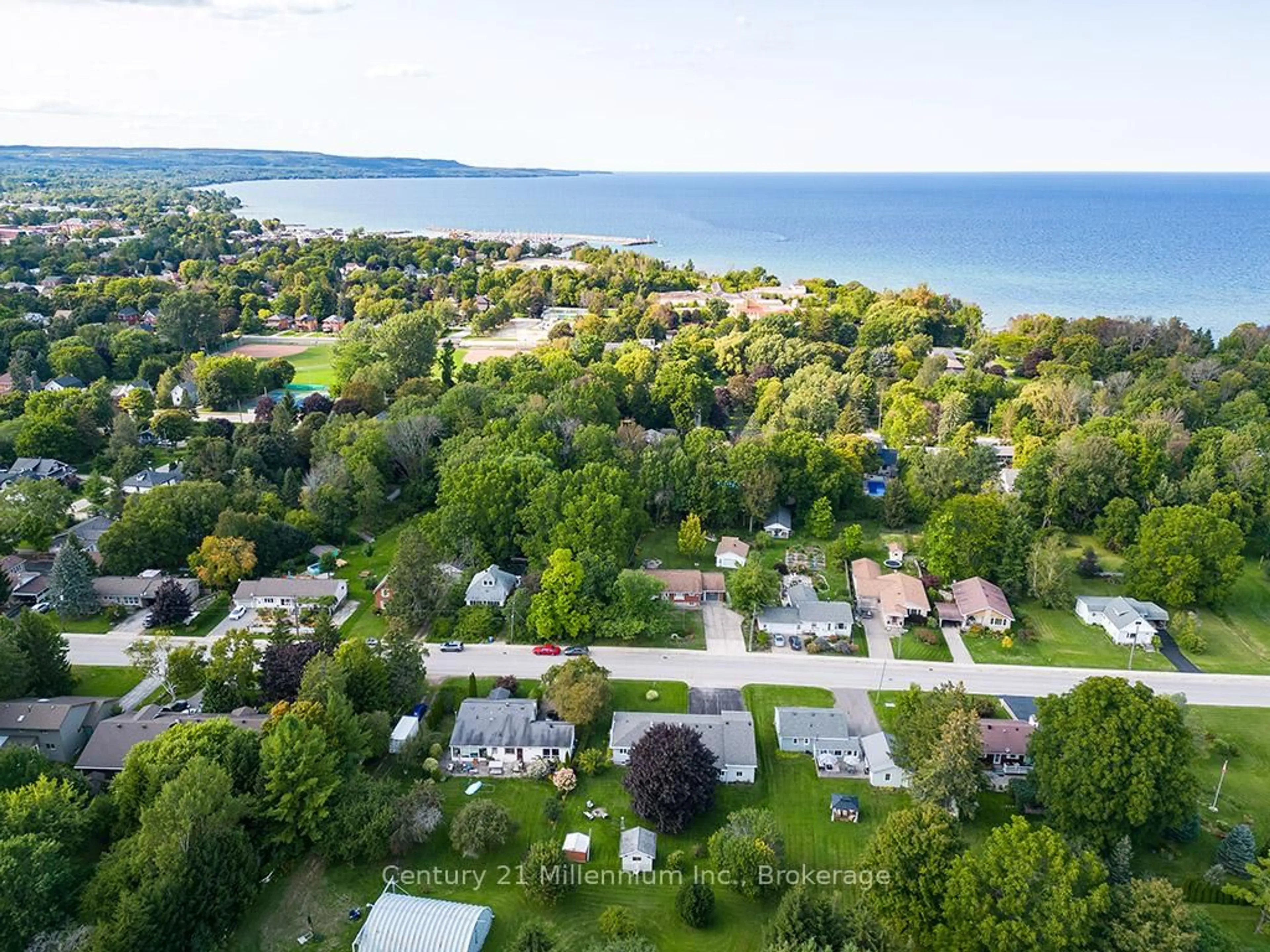 A pic from outside/outdoor area/front of a property/back of a property/a pic from drone, water/lake/river/ocean view for 203 Aiken St, Meaford Ontario N4L 1B3