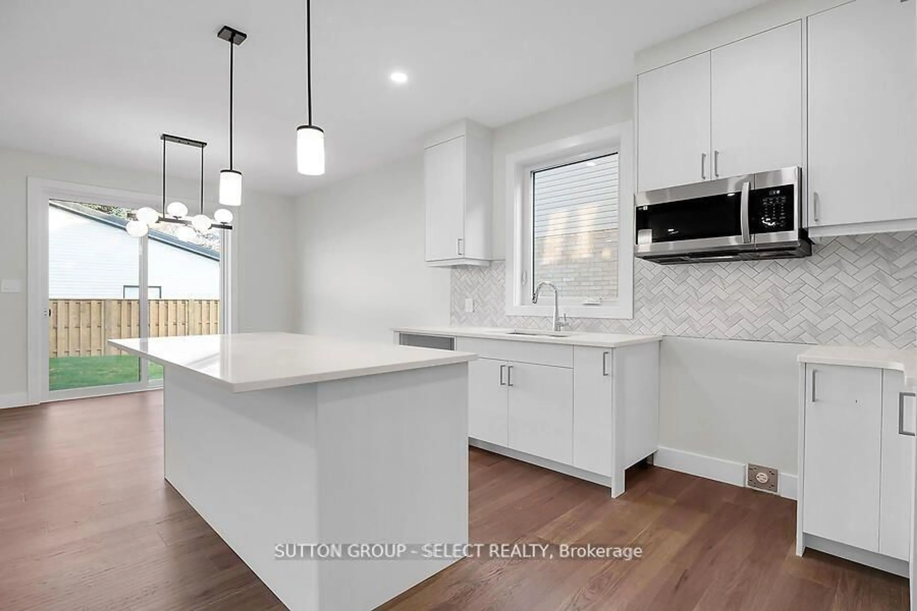 Open concept kitchen, ceramic/tile floor for 7966 Fallon Dr #17, Lucan Biddulph Ontario N0M 1V0