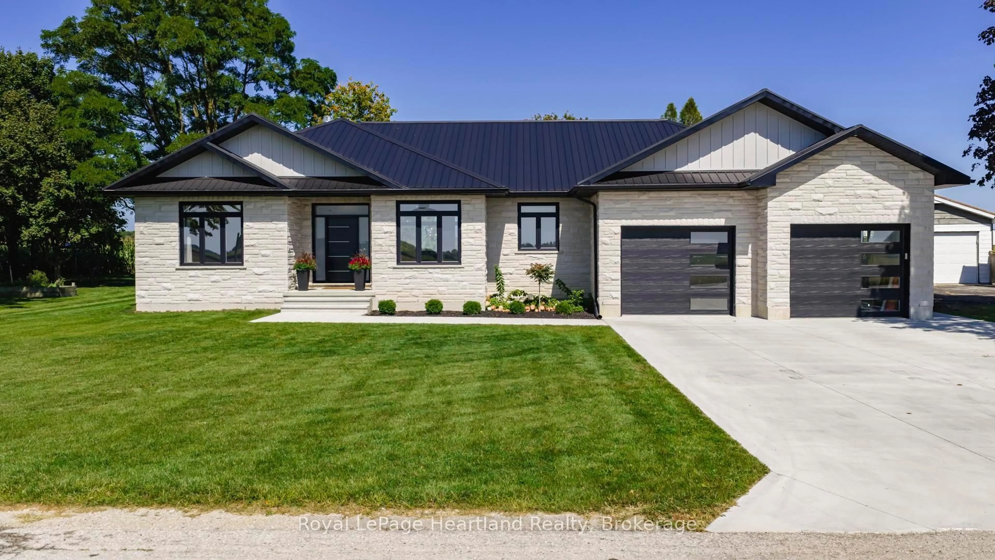 Home with brick exterior material, street for 40282 Huron St, South Huron Ontario N0M 1S1