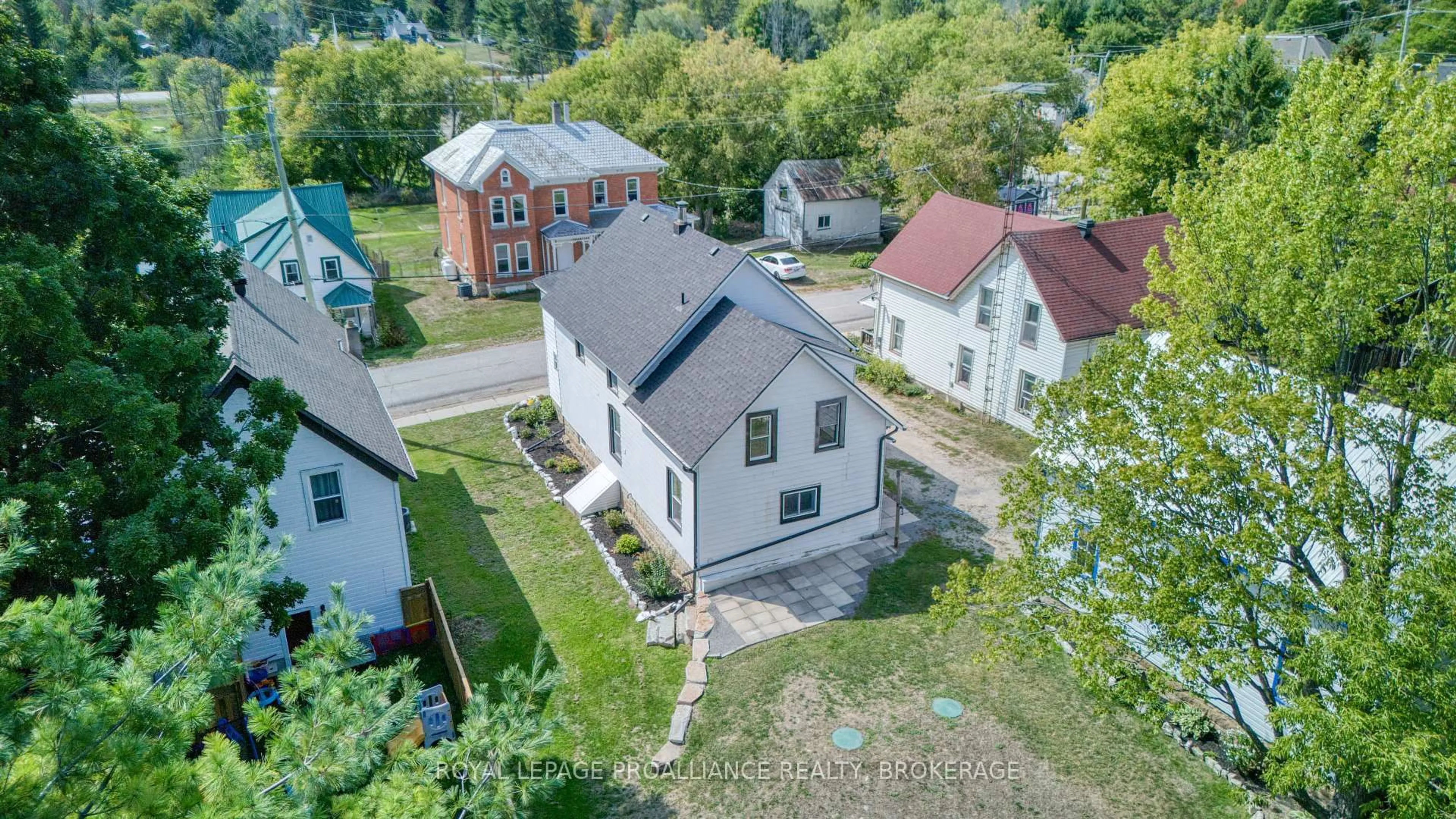 A pic from outside/outdoor area/front of a property/back of a property/a pic from drone, street for 13 Kingston St, Rideau Lakes Ontario K0G 1E0