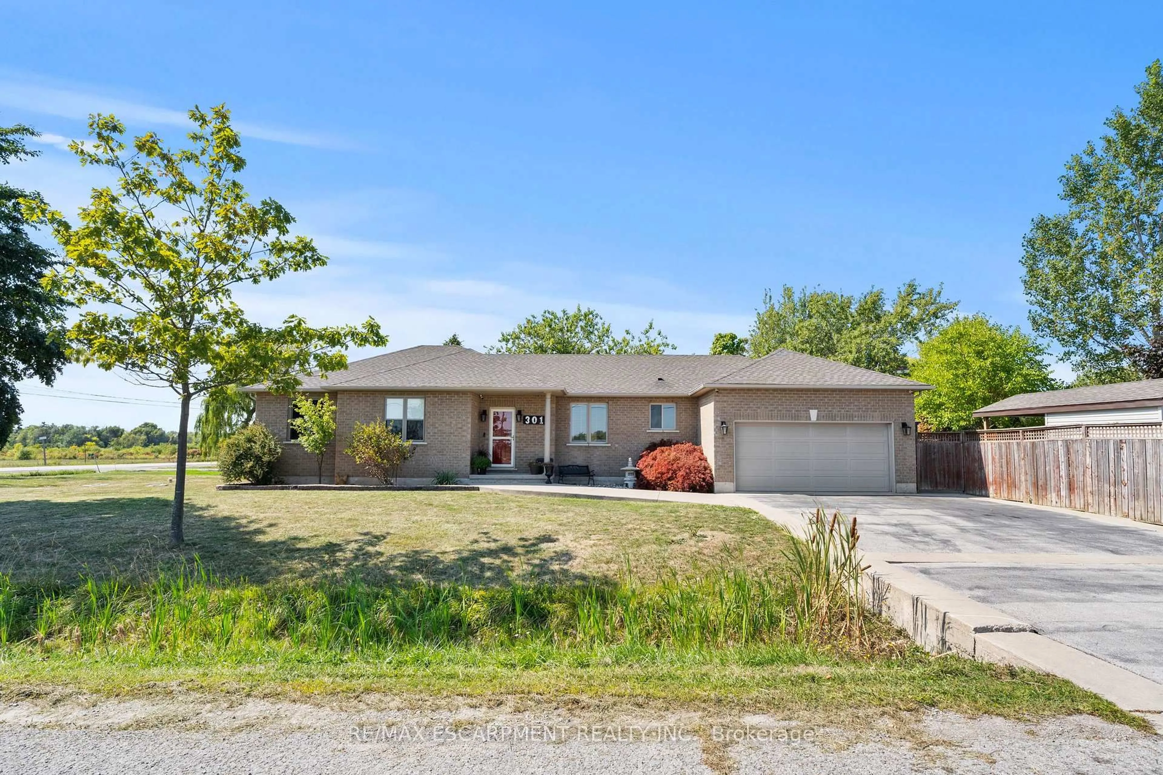 A pic from outside/outdoor area/front of a property/back of a property/a pic from drone, street for 301 Mud St, Hamilton Ontario L8J 2X7