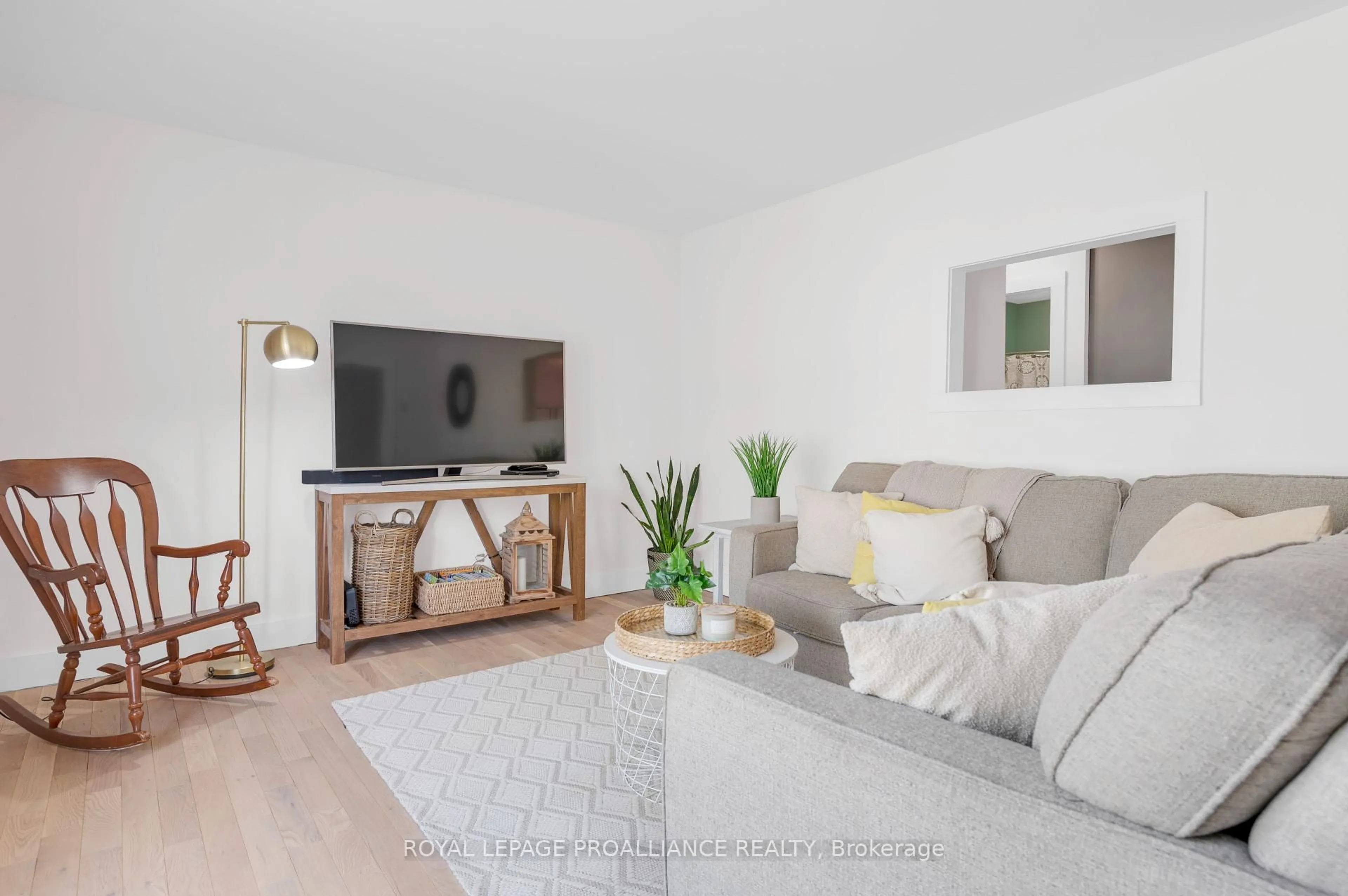 Living room with furniture, wood/laminate floor for 538 Metcalf St, Tweed Ontario K0K 3J0