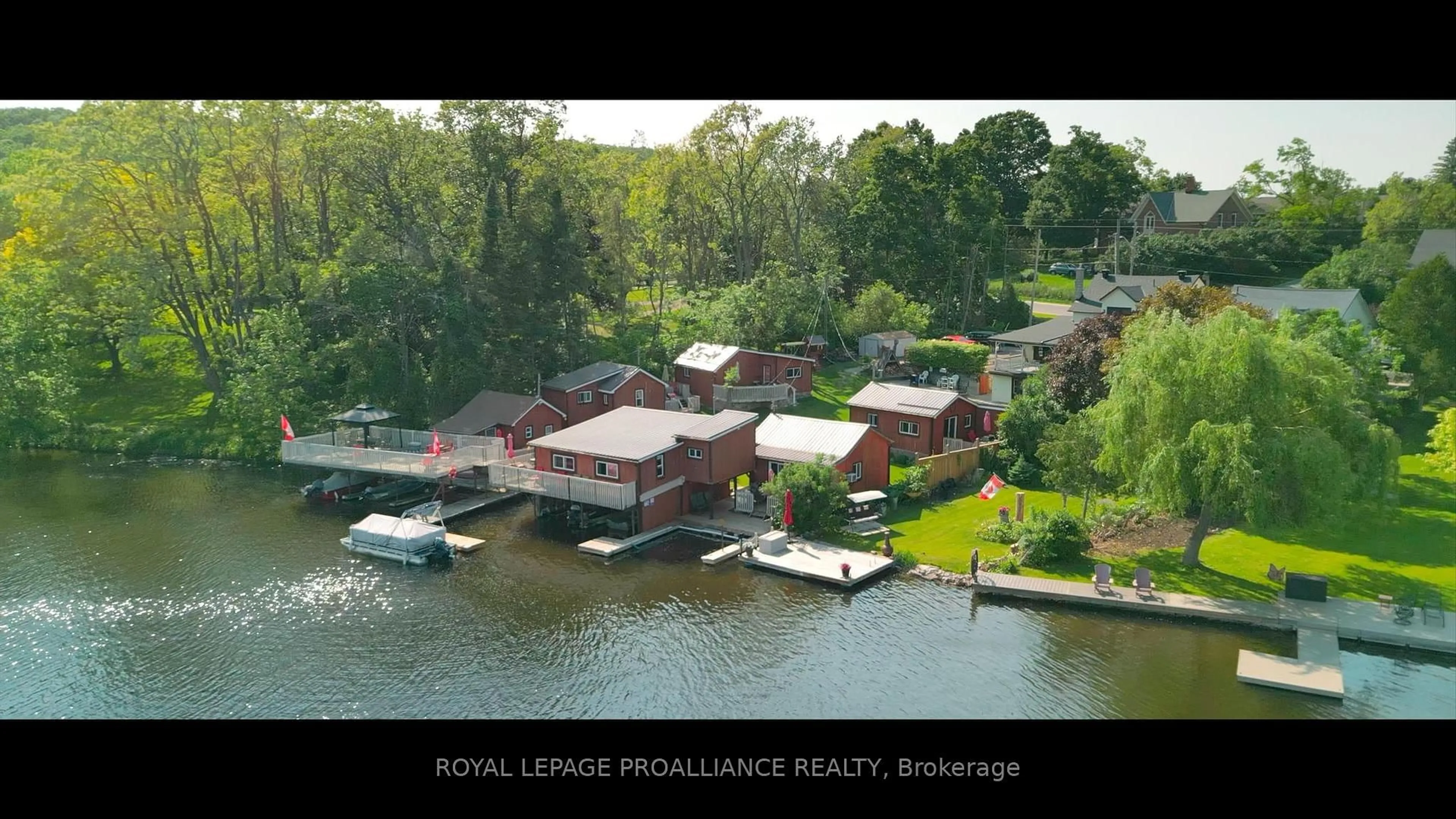 A pic from outside/outdoor area/front of a property/back of a property/a pic from drone, water/lake/river/ocean view for 118 Front St, Trent Hills Ontario K0L 1Y0