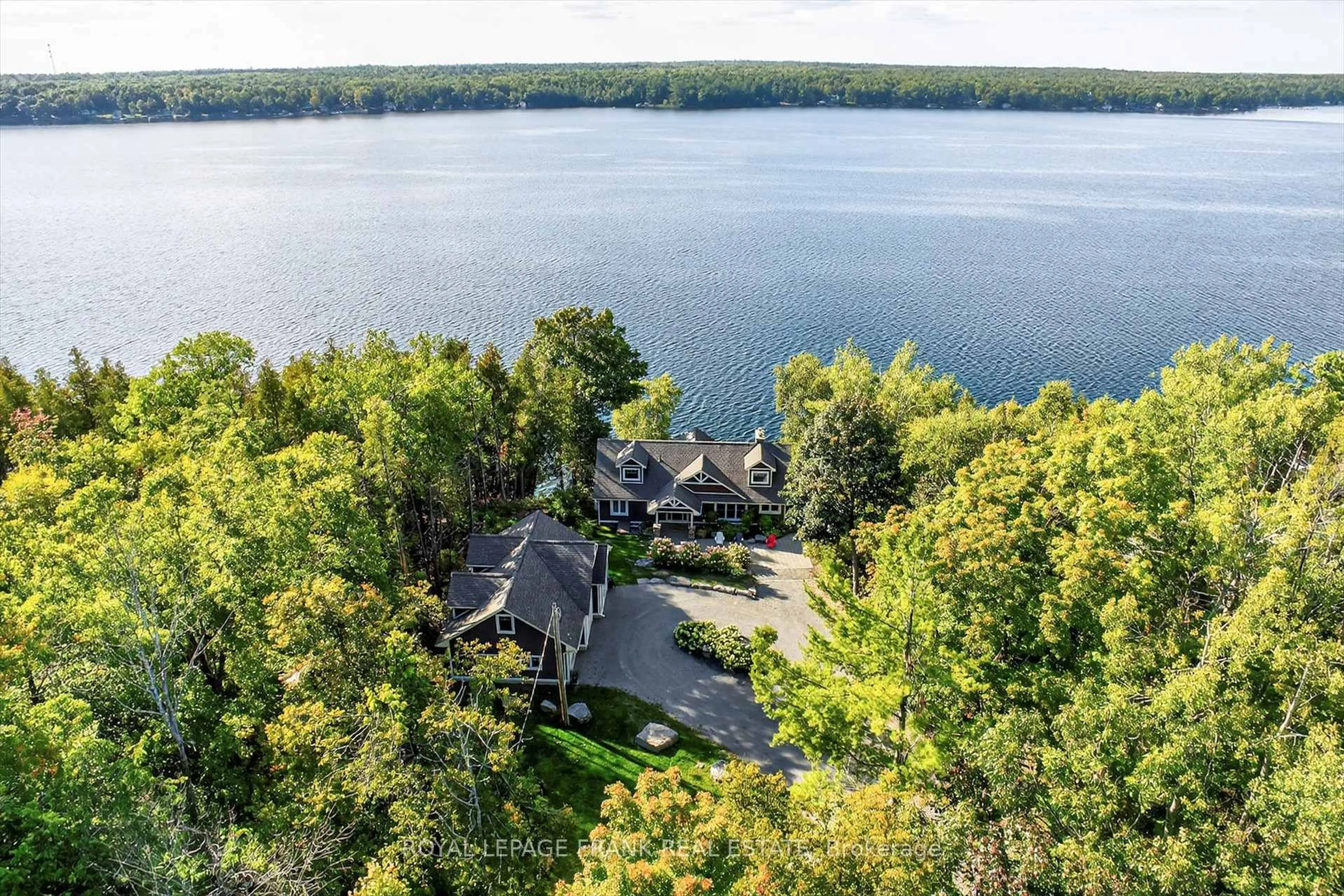 A pic from outside/outdoor area/front of a property/back of a property/a pic from drone, water/lake/river/ocean view for 1082 Tedford Lane, Douro-Dummer Ontario K0L 2H0