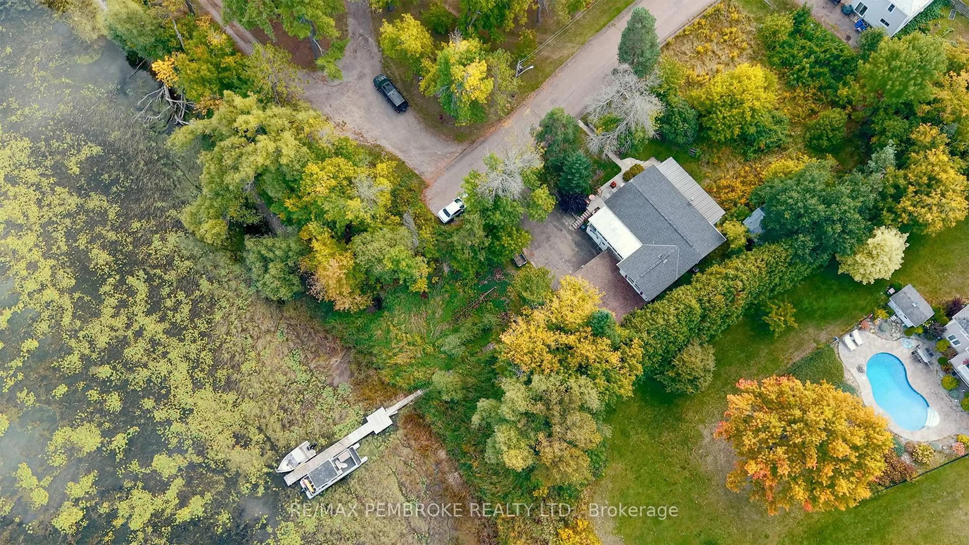 A pic from outside/outdoor area/front of a property/back of a property/a pic from drone, forest/trees view for 2 Cowley St, Cobden Ontario K0J 1K0