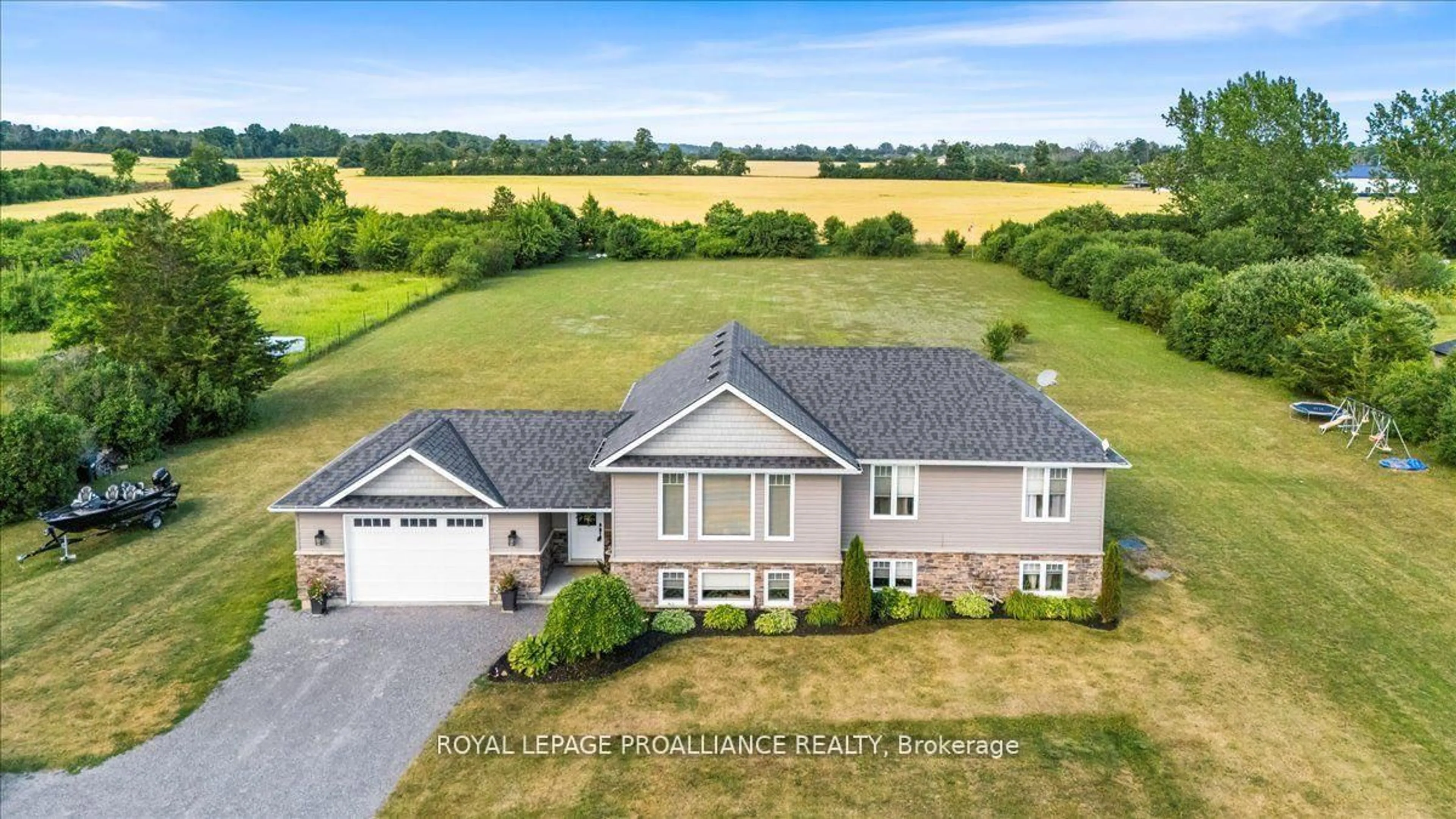 A pic from outside/outdoor area/front of a property/back of a property/a pic from drone, water/lake/river/ocean view for 20846 Loyalist Parkway, Prince Edward County Ontario K0K 1T0