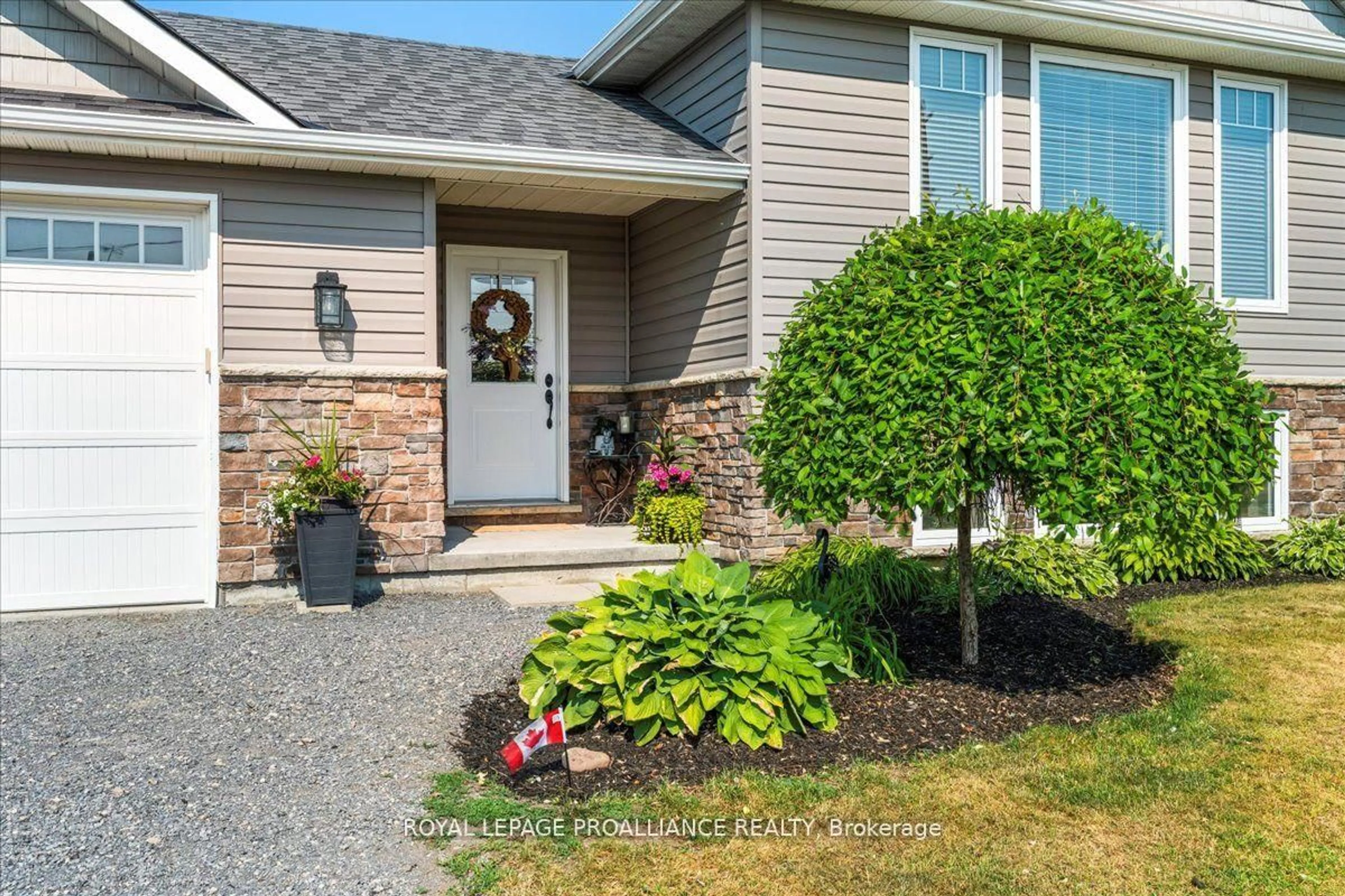 Home with vinyl exterior material, street for 20846 Loyalist Parkway, Prince Edward County Ontario K0K 1T0