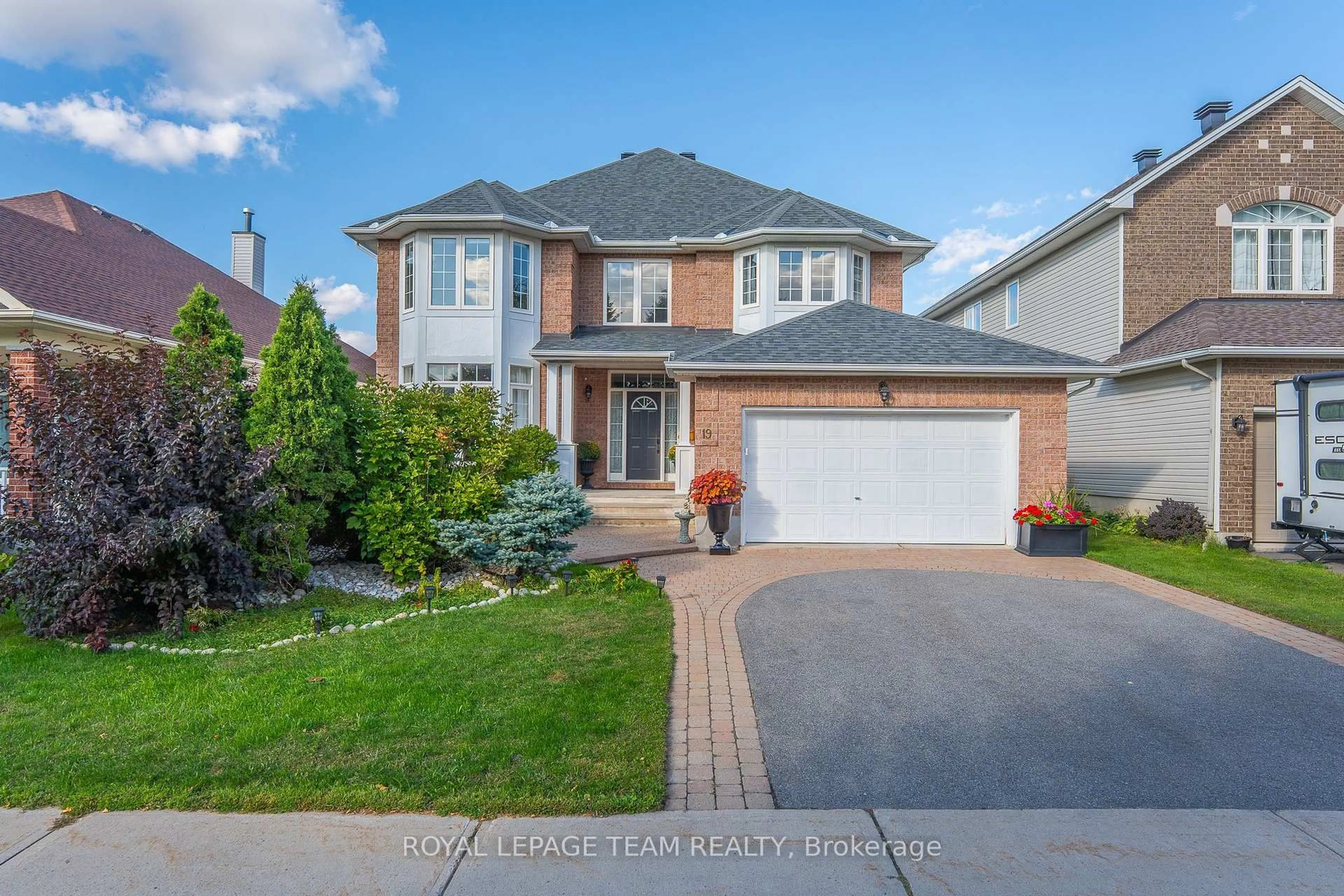 Home with brick exterior material, street for 19 Black Tern Cres, Ottawa Ontario K2M 2Z4