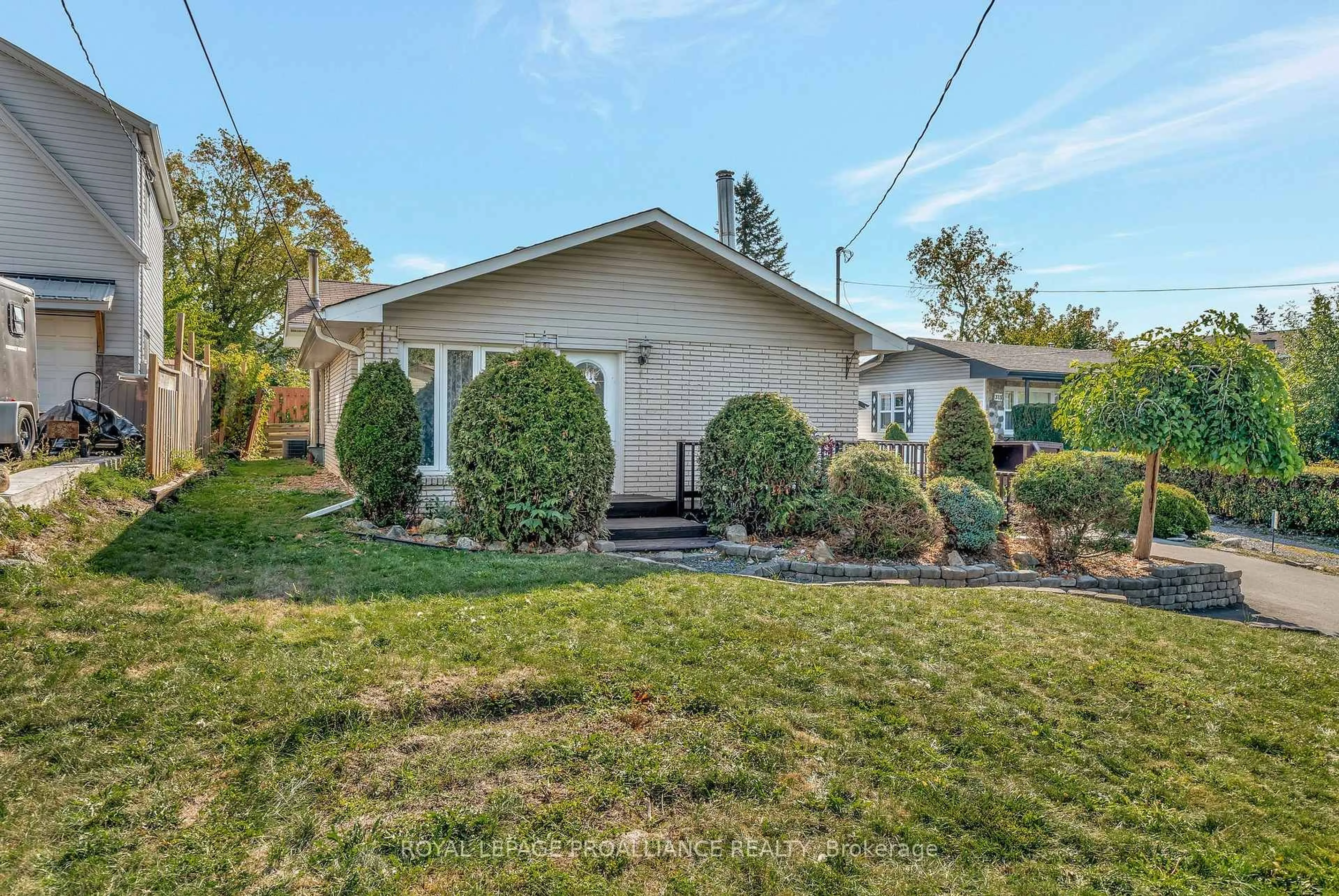Home with vinyl exterior material, street for 317 Sidney St, Quinte West Ontario K8V 2V1