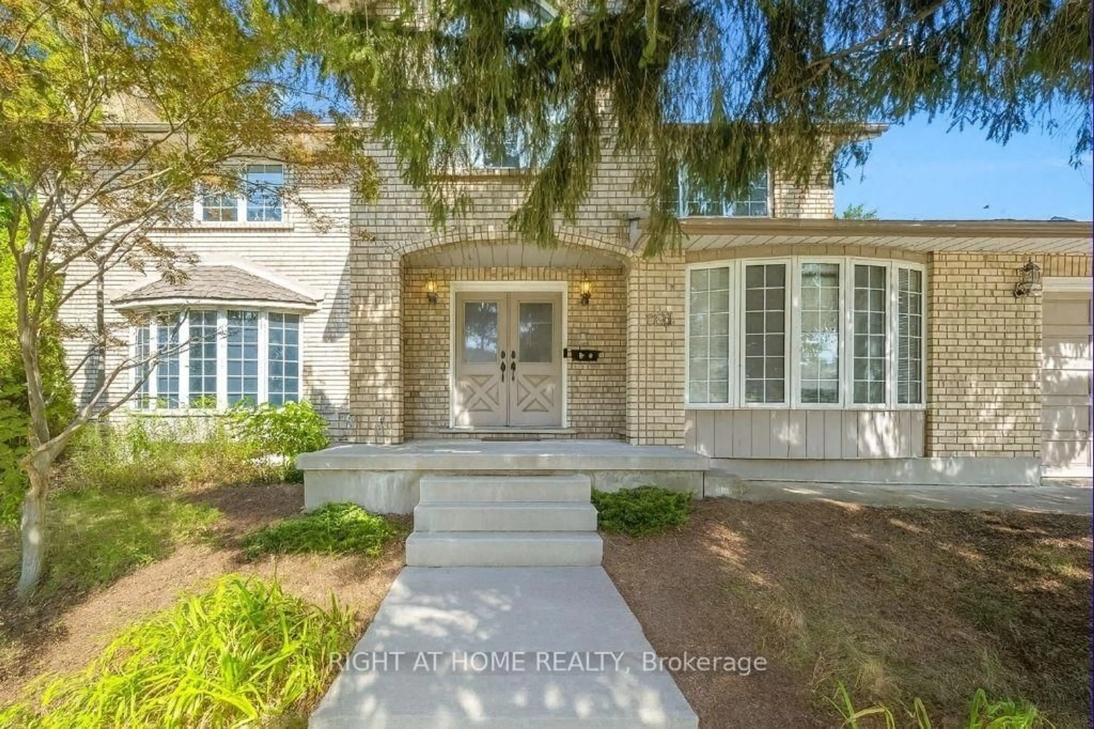 Home with brick exterior material, street for 701 University Ave, Waterloo Ontario N2K 3V1