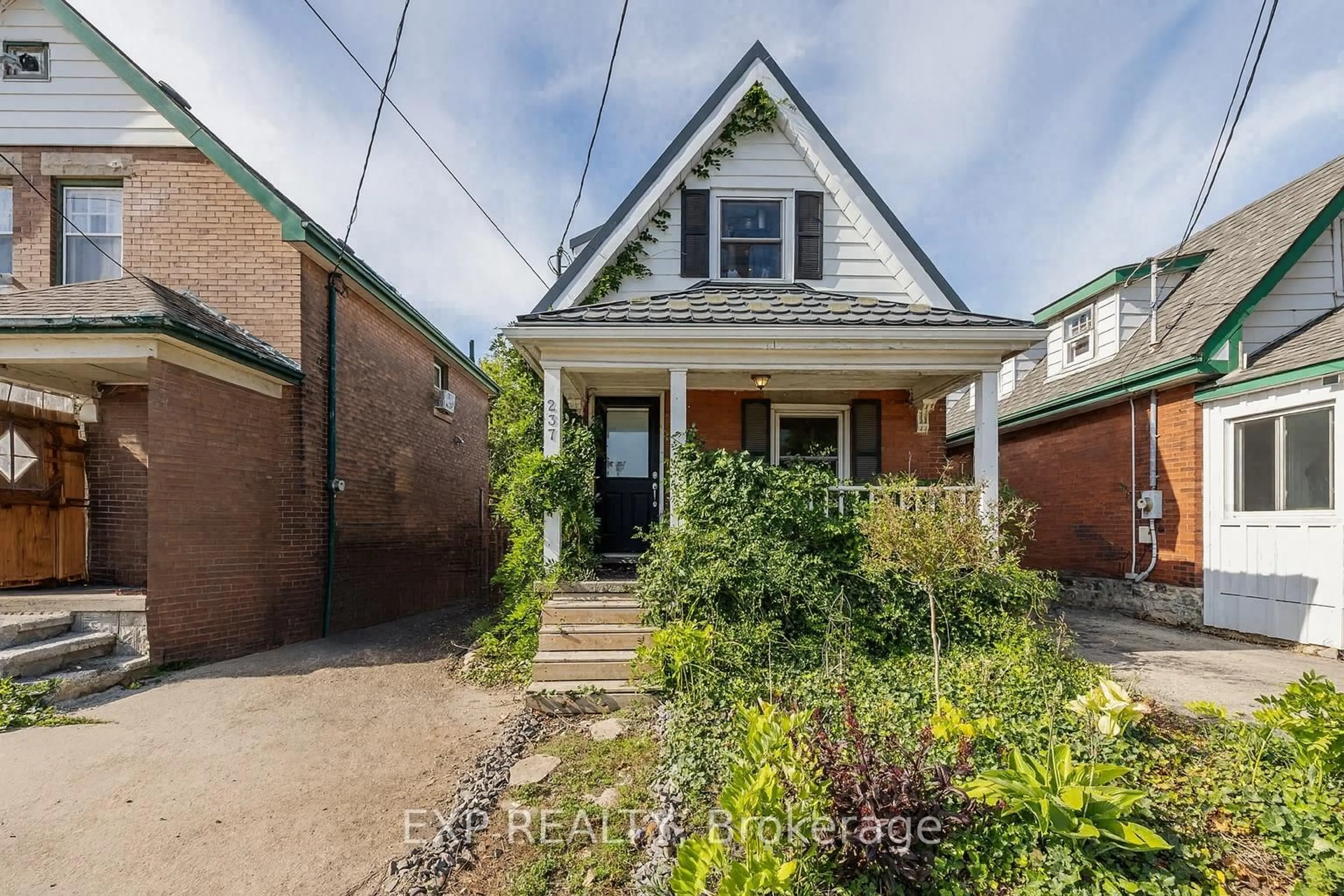 Home with brick exterior material, street for 237 Victoria Rd, Guelph Ontario N1E 5P9