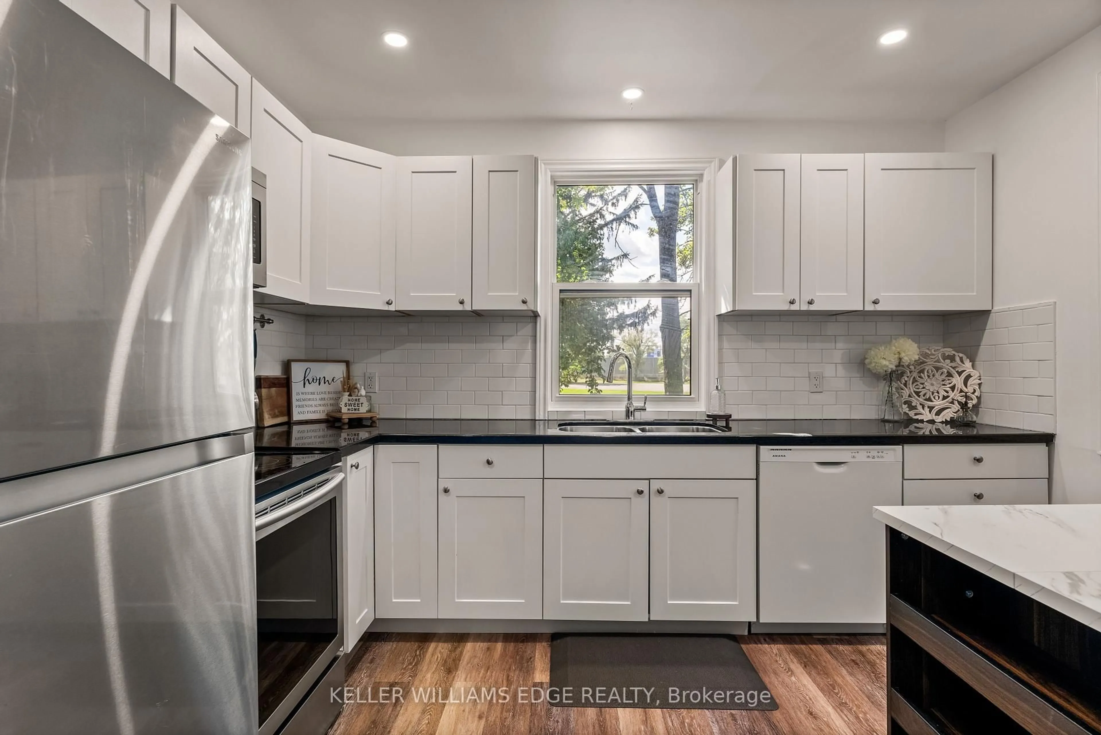 Open concept kitchen, ceramic/tile floor for 19 Currie St, St. Catharines Ontario L2M 5M7