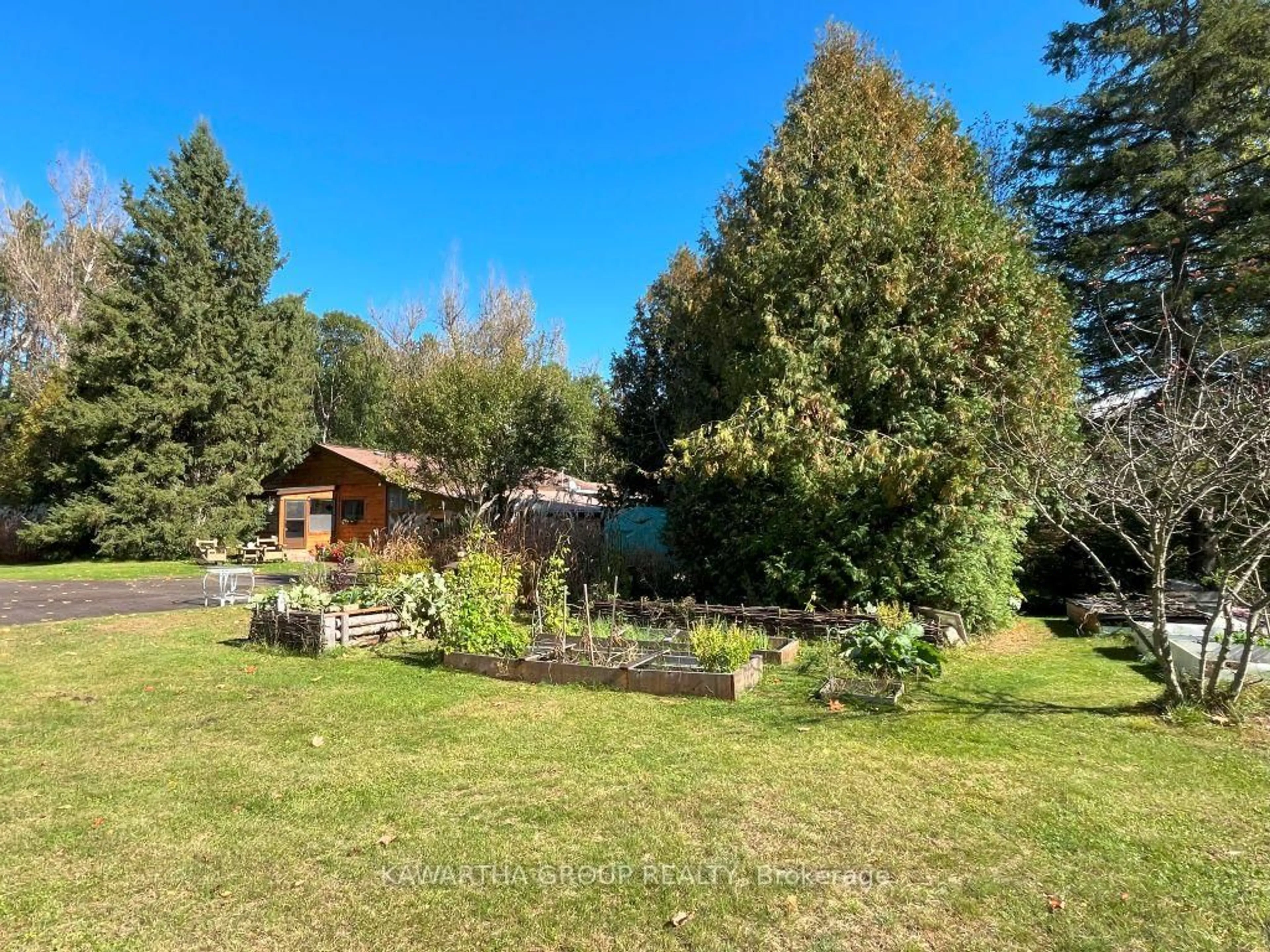 A pic from outside/outdoor area/front of a property/back of a property/a pic from drone, unknown for 8056 35 Highway, Kawartha Lakes Ontario K0M 2L0