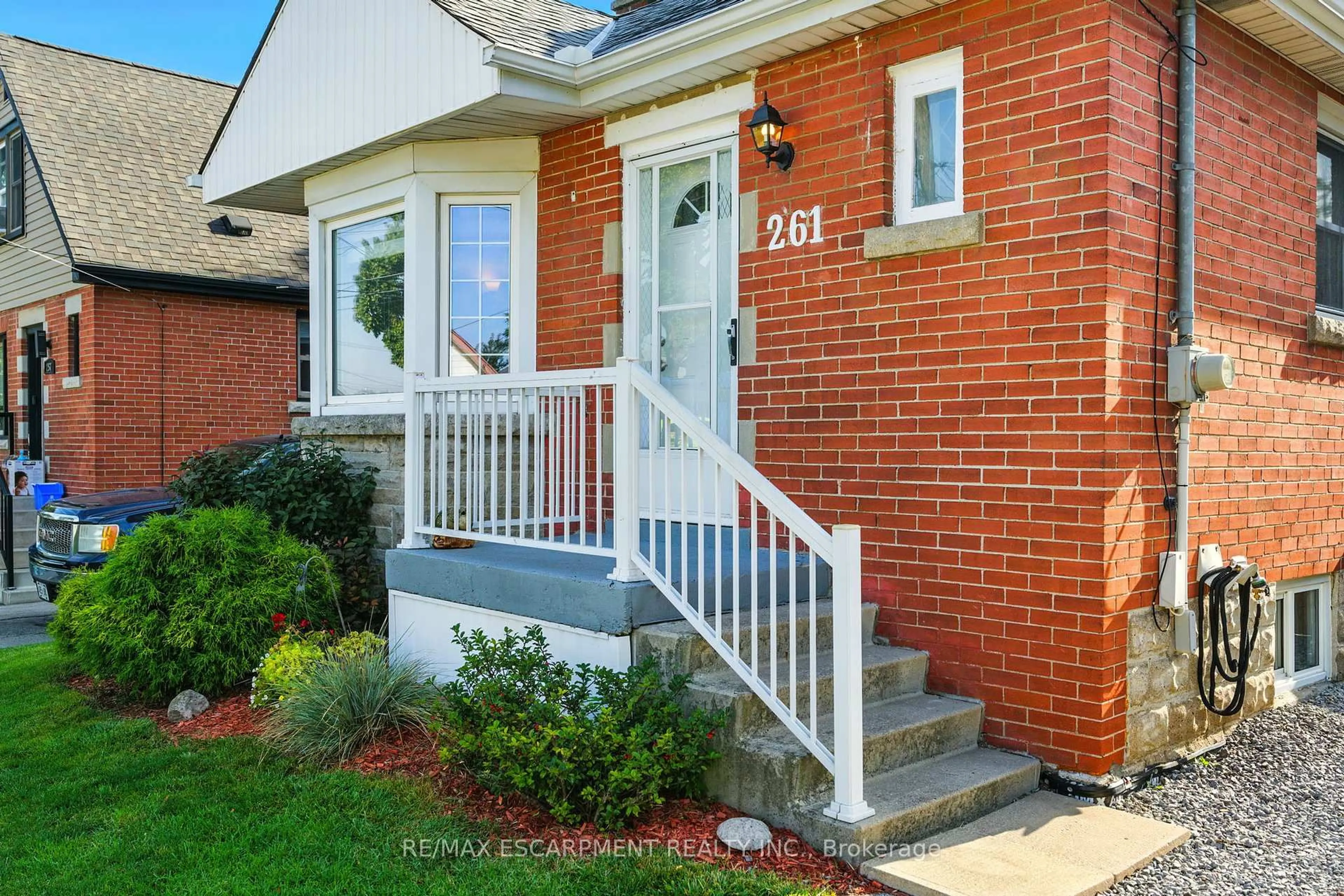 Home with brick exterior material, street for 261 East 14th St, Hamilton Ontario L9A 4B8