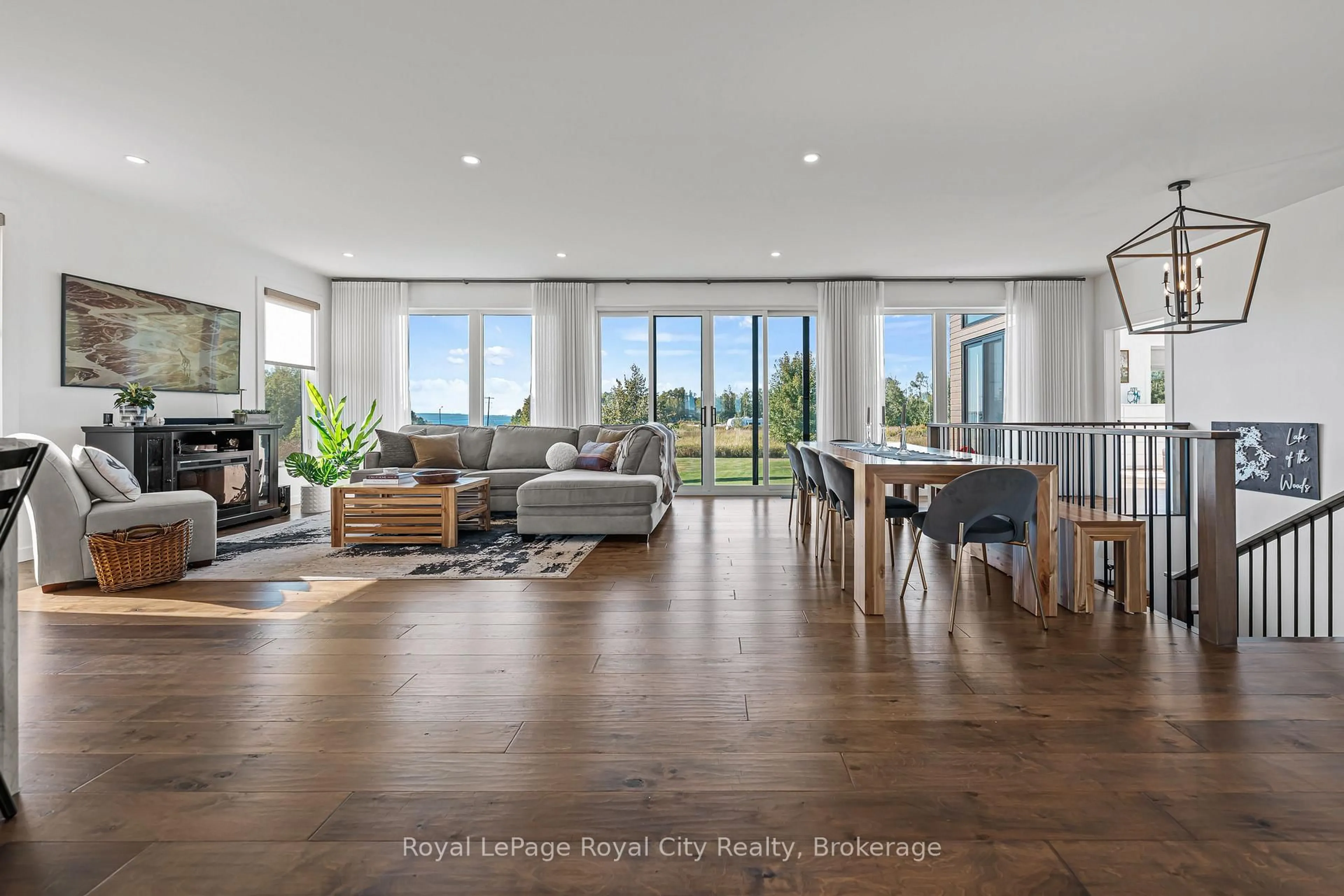 Living room with furniture, wood/laminate floor for 103 Ugovsek Cres, Meaford Ontario N0H 1B0