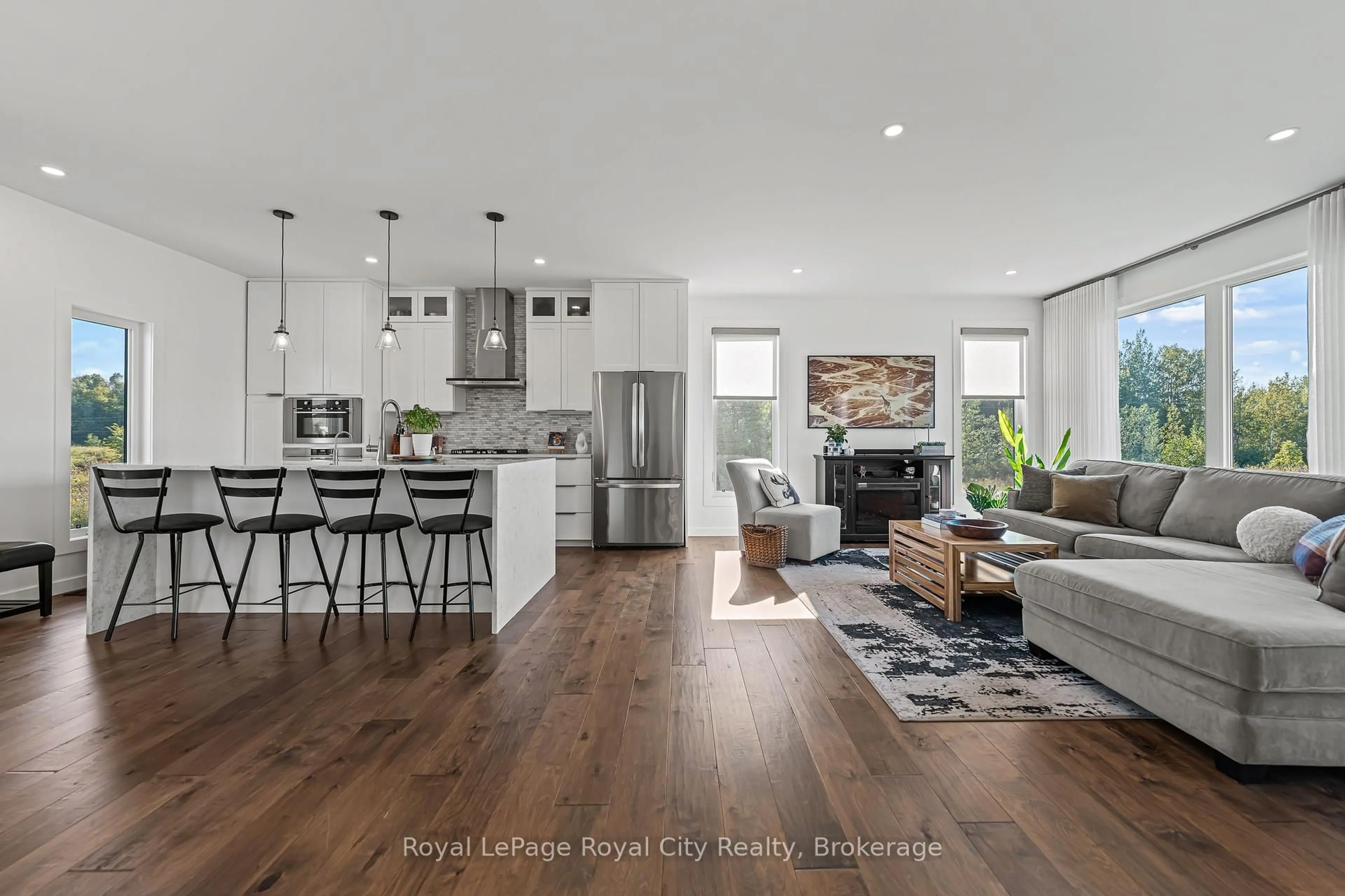 Open concept kitchen, wood/laminate floor for 103 Ugovsek Cres, Meaford Ontario N0H 1B0