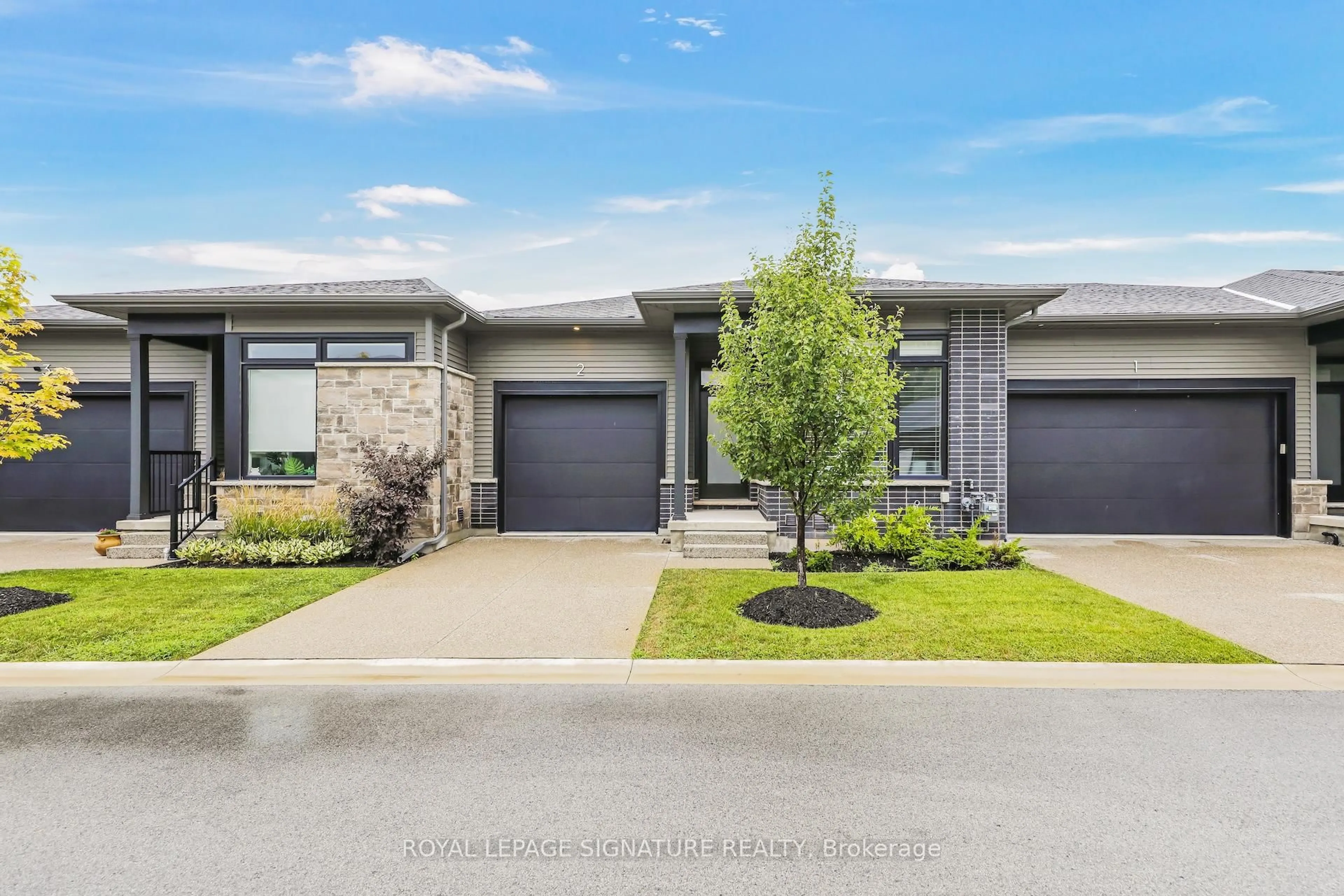 Home with brick exterior material, street for 8974 Willoughby Dr #2, Niagara Falls Ontario L2G 7Y4