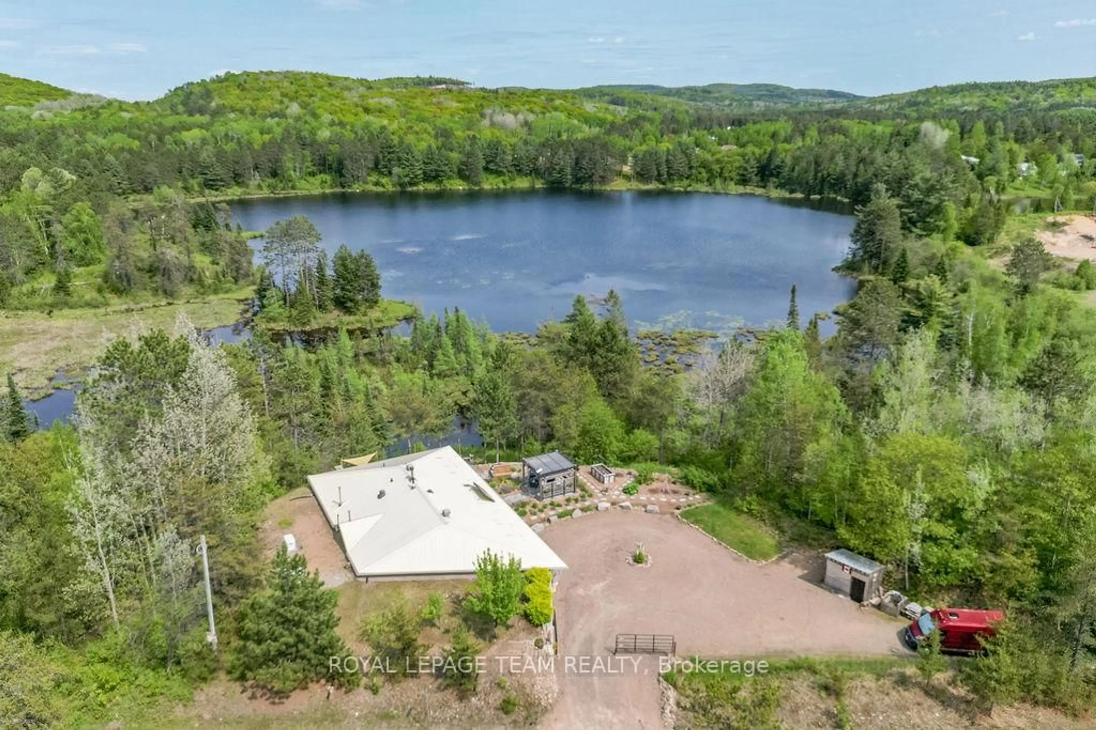 A pic from outside/outdoor area/front of a property/back of a property/a pic from drone, water/lake/river/ocean view for 188 Paugh Lake Rd, Barry's Bay Ontario K0J 1B0