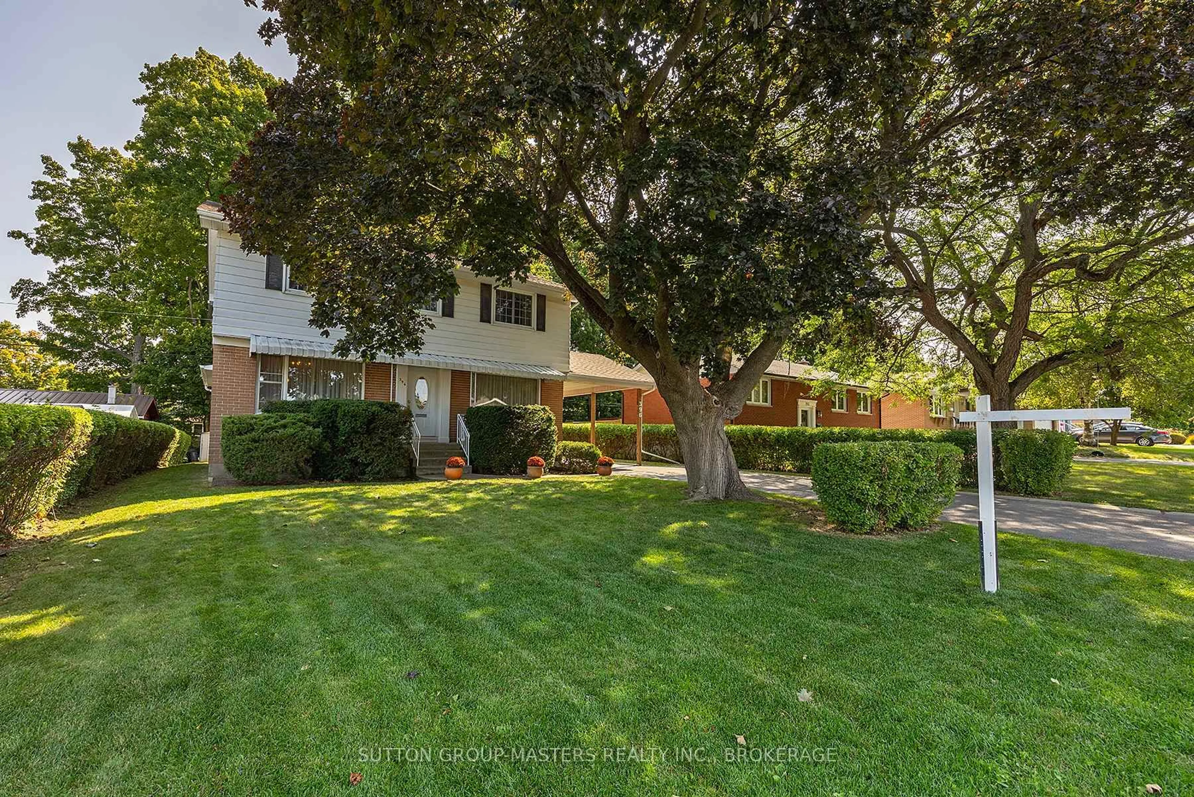 A pic from outside/outdoor area/front of a property/back of a property/a pic from drone, street for 396 Roosevelt Dr, Kingston Ontario K7M 4A7