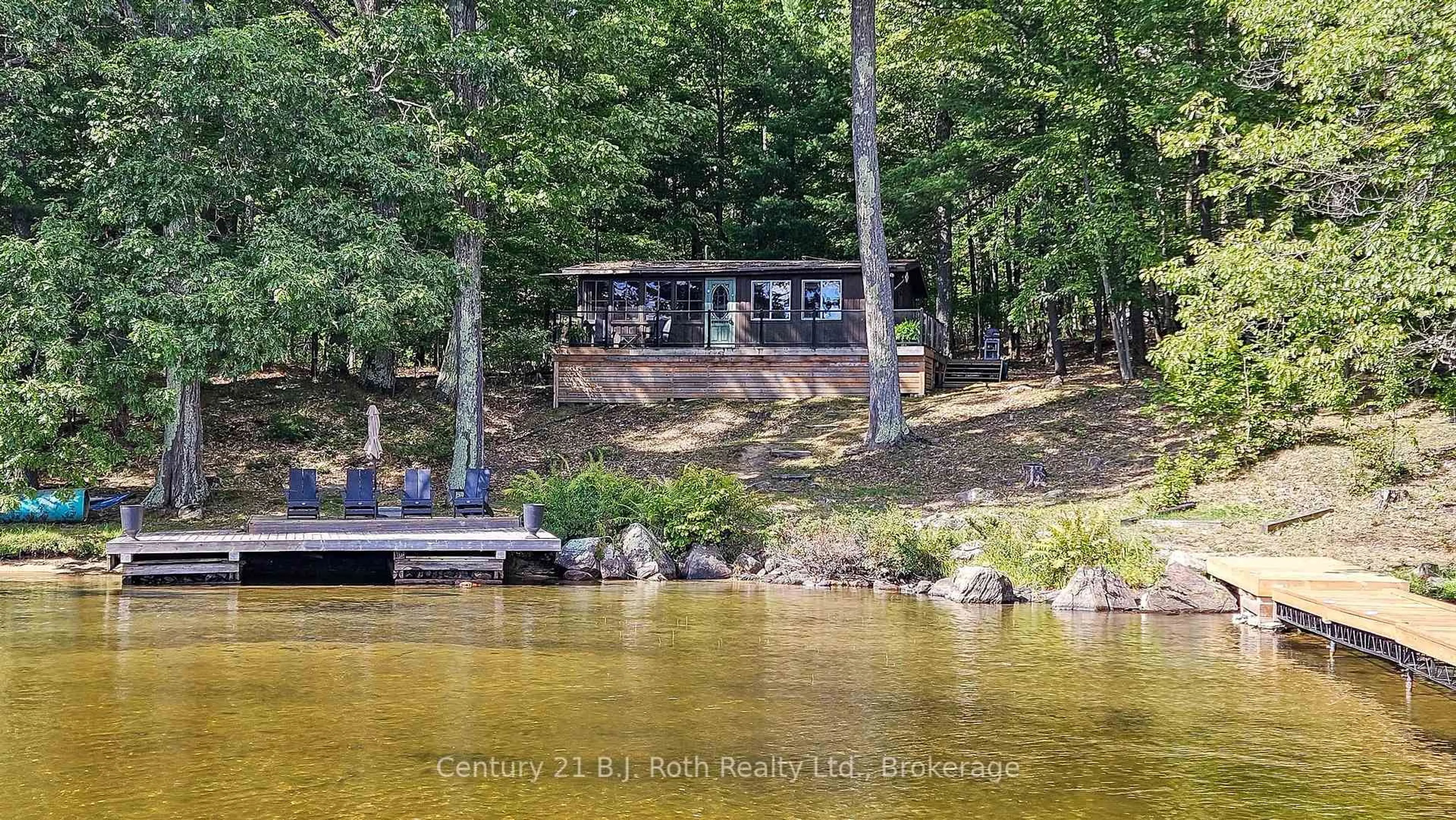 A pic from outside/outdoor area/front of a property/back of a property/a pic from drone, water/lake/river/ocean view for 520 Browning Island, Bracebridge Ontario P1L 1X2