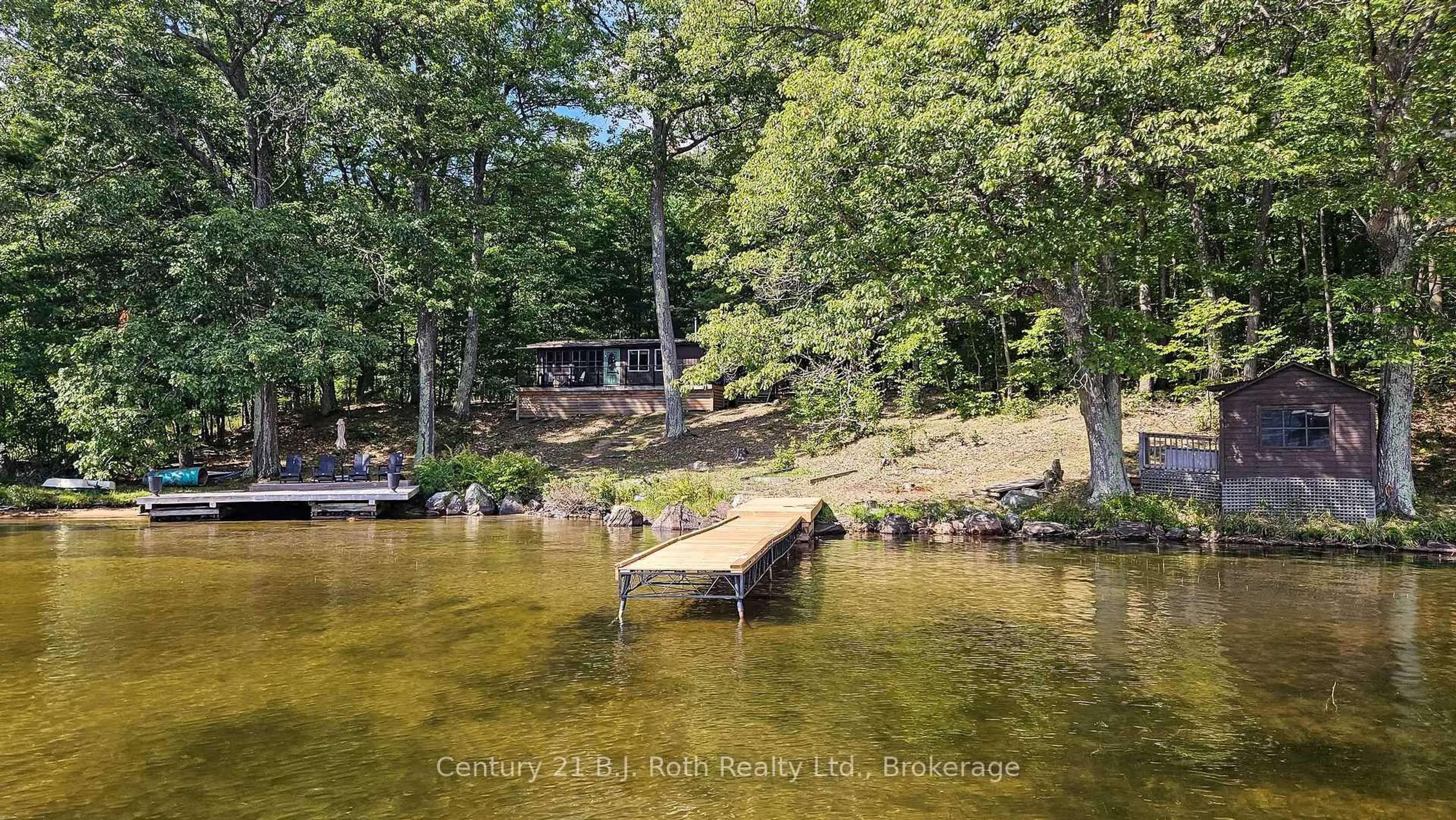 A pic from outside/outdoor area/front of a property/back of a property/a pic from drone, water/lake/river/ocean view for 520 Browning Island, Bracebridge Ontario P1L 1X2