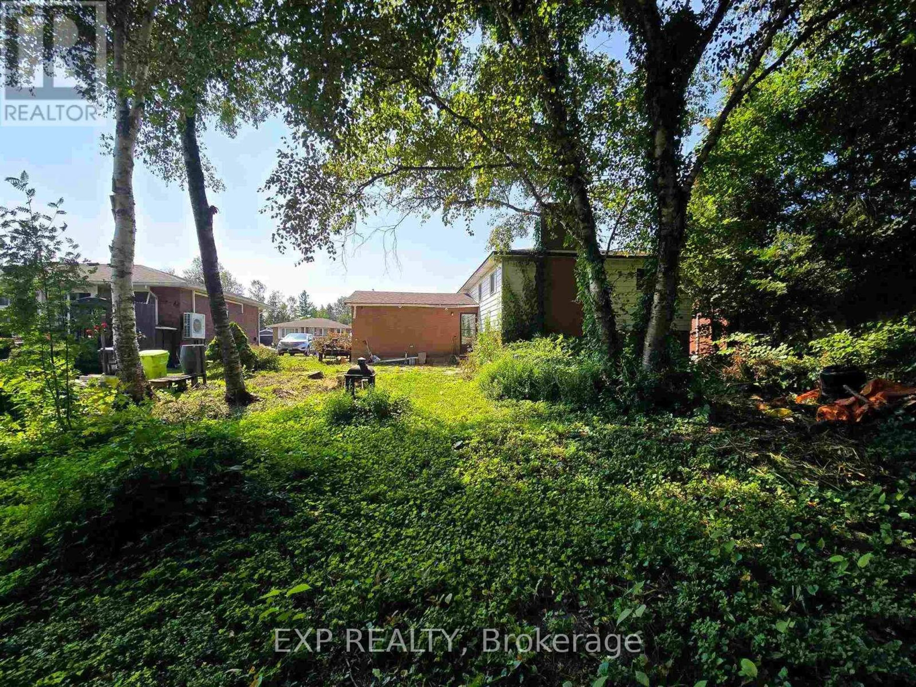 A pic from outside/outdoor area/front of a property/back of a property/a pic from drone, water/lake/river/ocean view for 14 Admiral Dr, Sault Ste Marie Ontario P6C 5W3