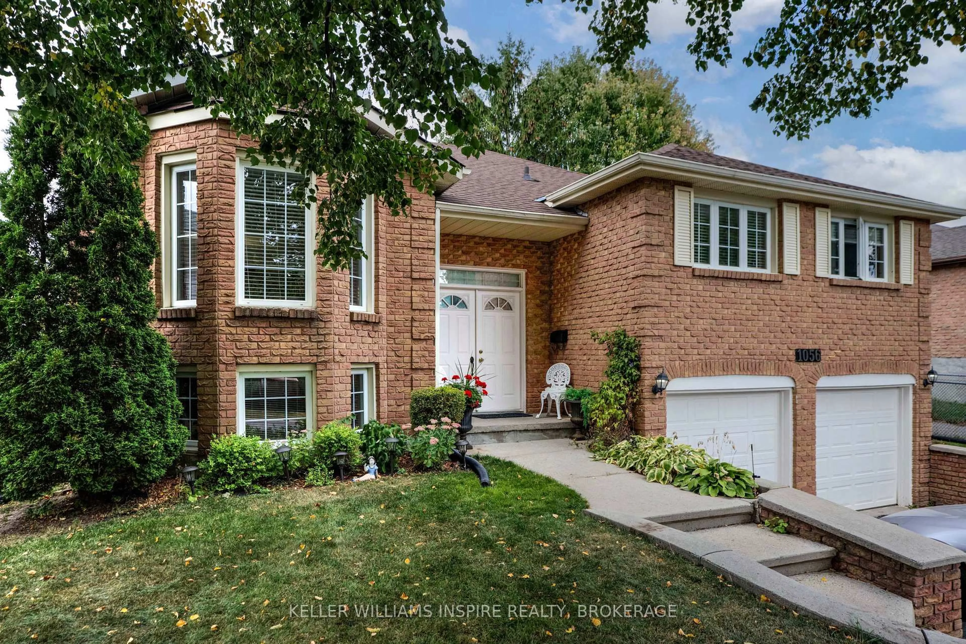 Home with brick exterior material, street for 1056 Palmerston Cres, Kingston Ontario K7P 2P5