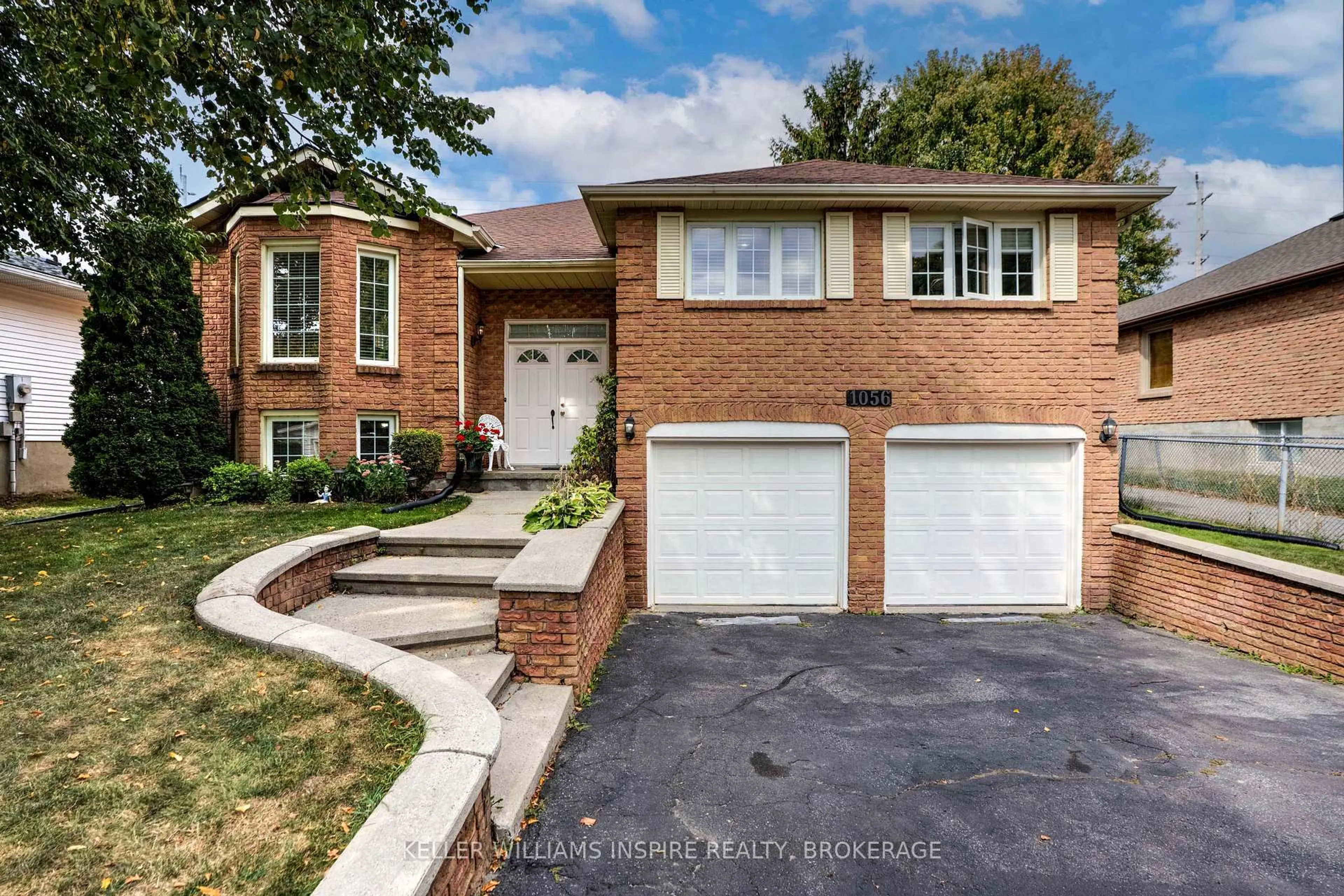 Home with brick exterior material, street for 1056 Palmerston Cres, Kingston Ontario K7P 2P5