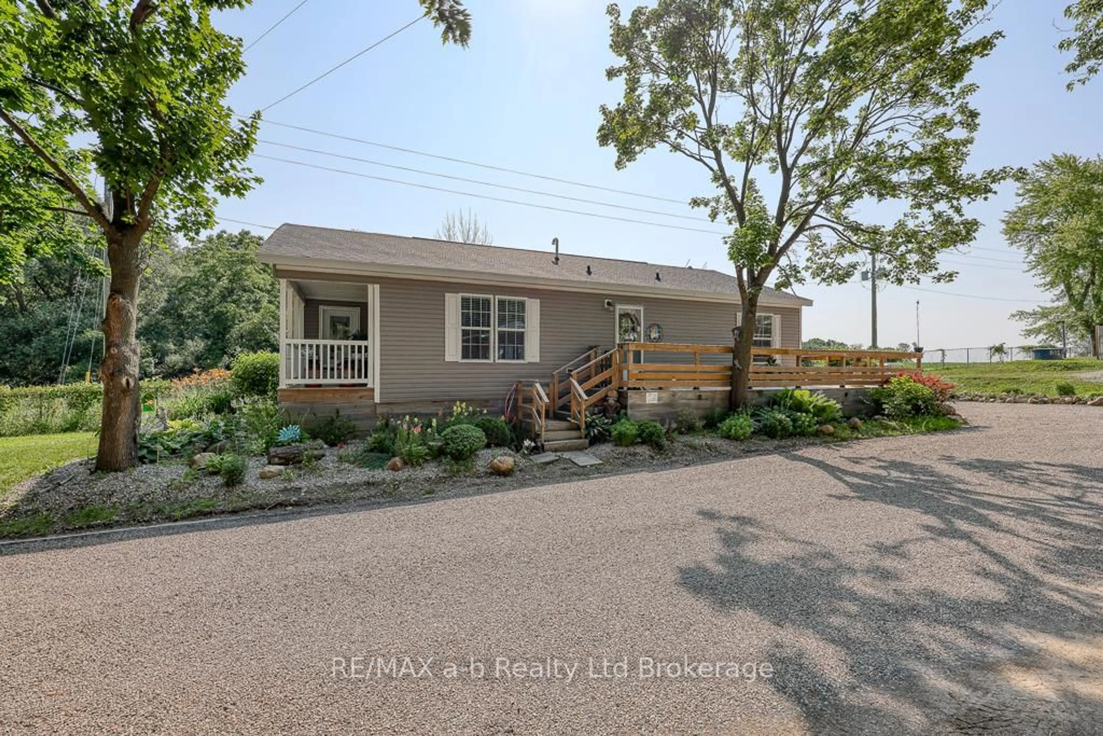 Home with vinyl exterior material, street for 99 FOURTH CONCESSION #171, Brant Ontario N0E 1A0