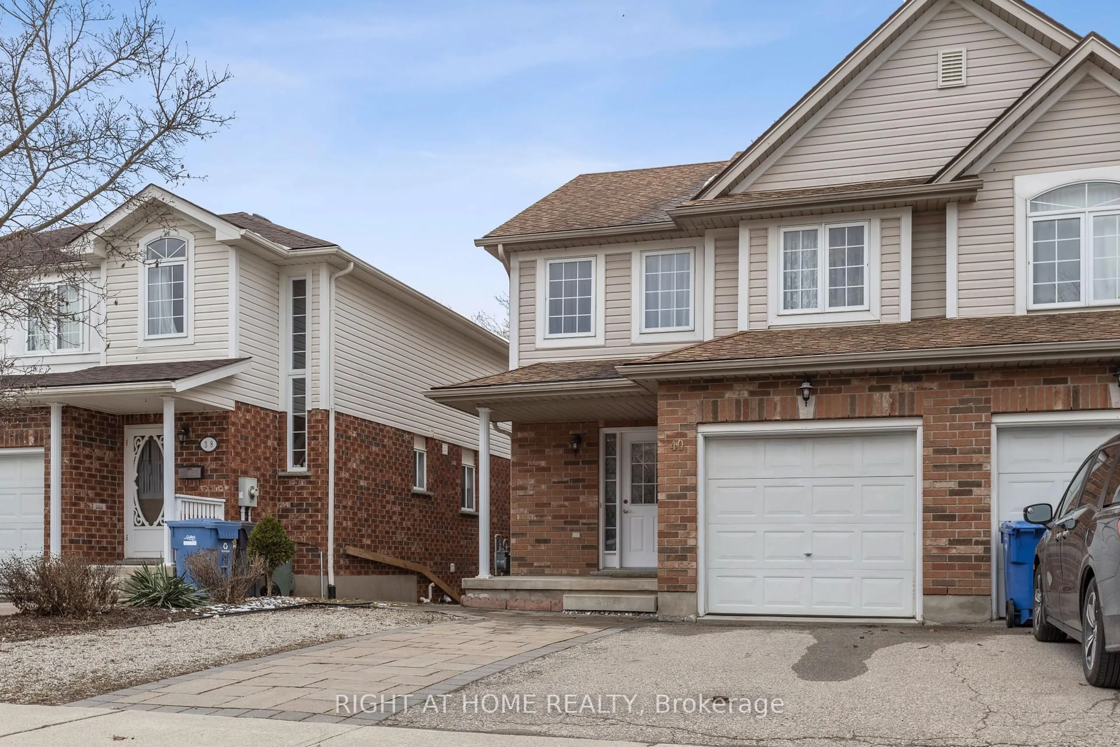 Home with brick exterior material, street for 40 Chillico Dr, Guelph Ontario N1K 1Y8
