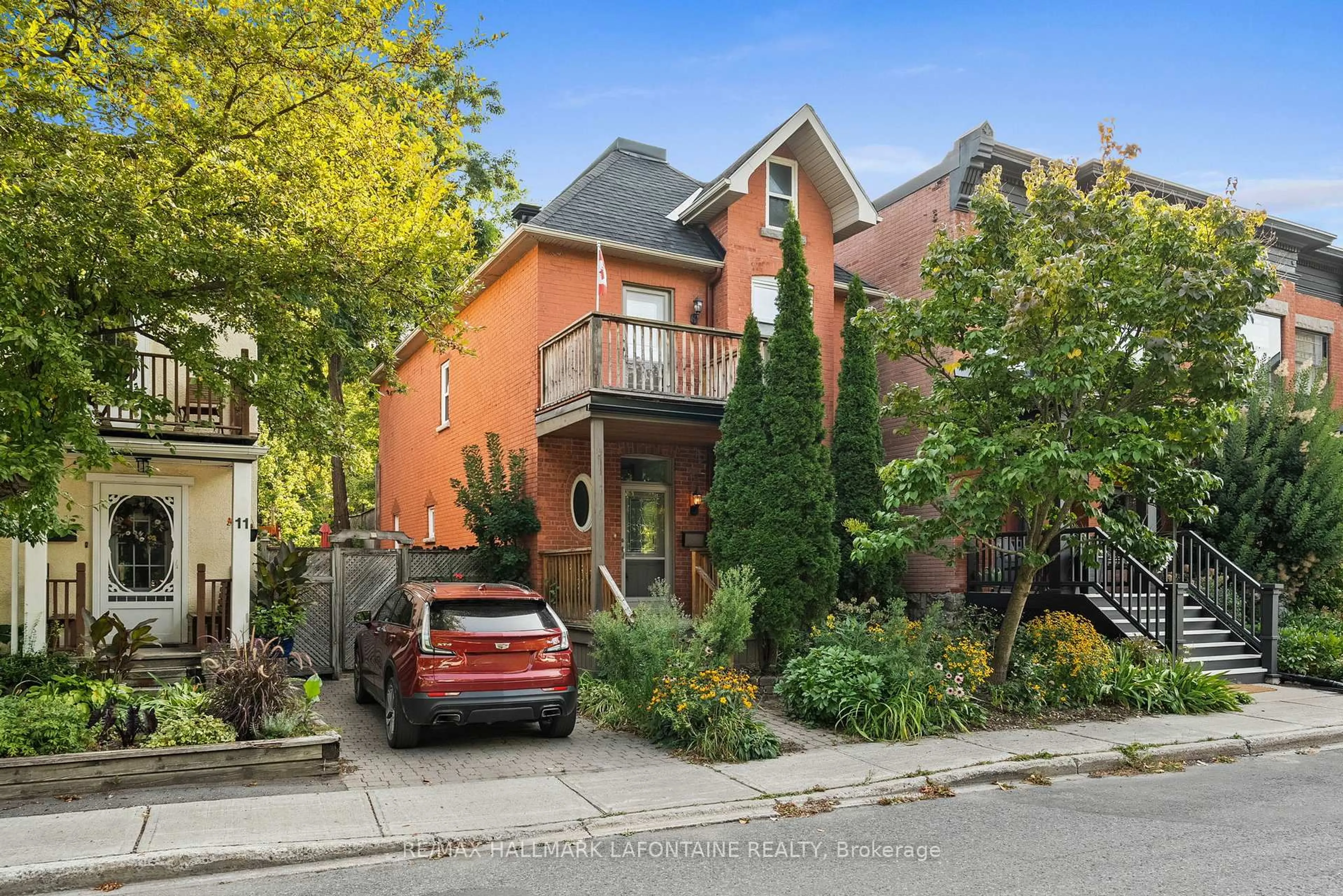 Home with brick exterior material, street for 13 Cathcart Sq, Ottawa Ontario K1N 5Z9