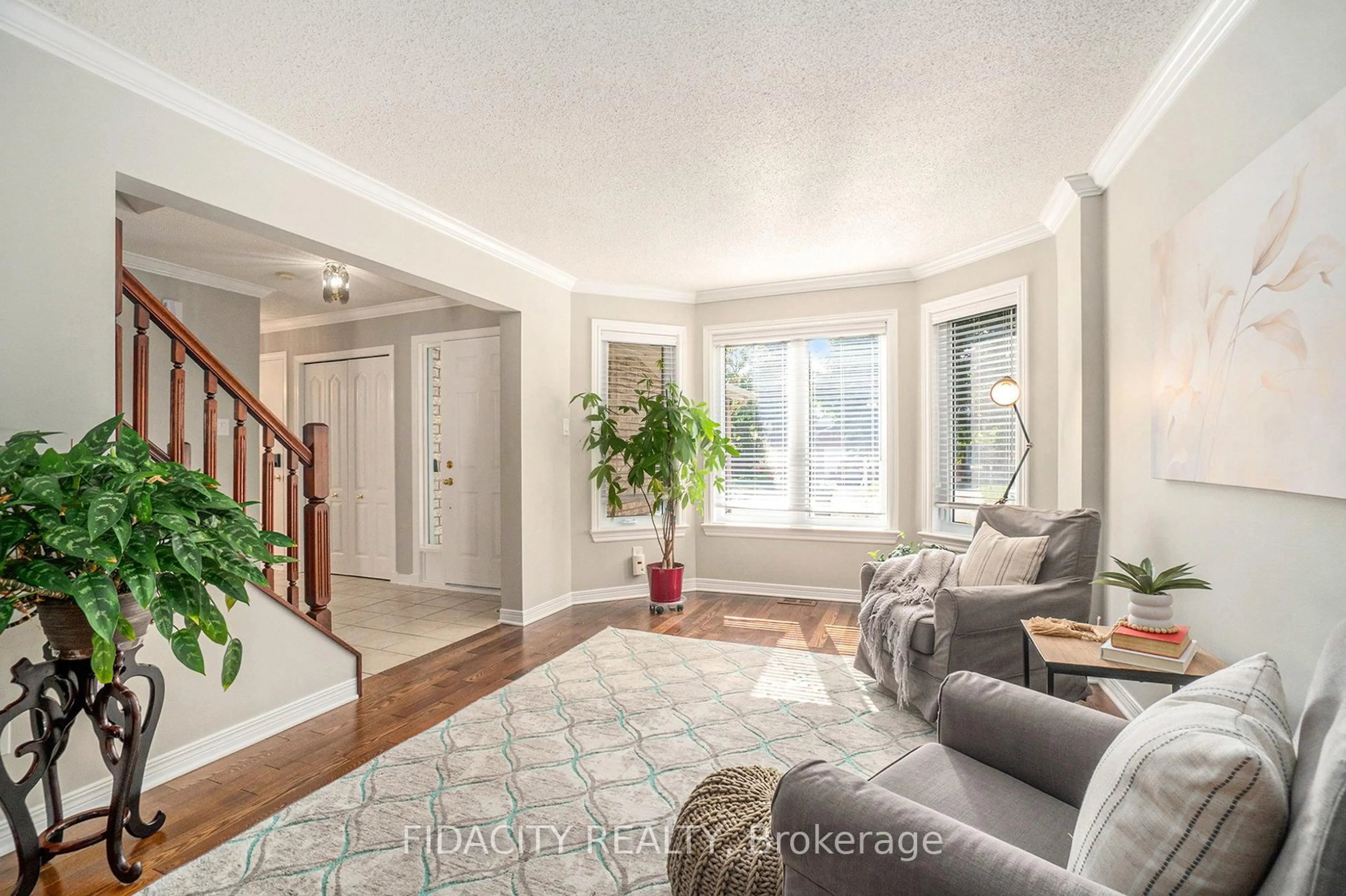 Living room with furniture, unknown for 45 Rowe Dr, Kanata Ontario K2L 3Y9