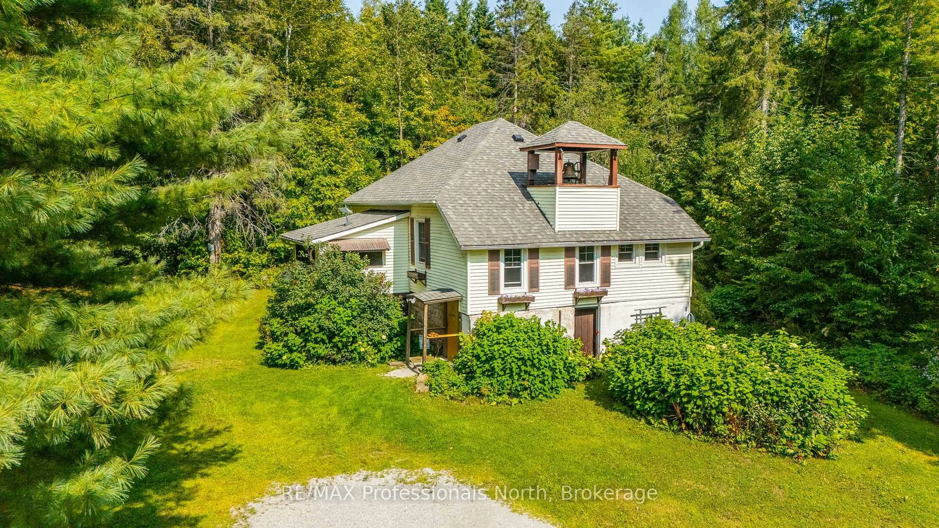 A pic from outside/outdoor area/front of a property/back of a property/a pic from drone, unknown for 9357 Highway 118 Highway, Minden Hills Ontario K0M 2K0