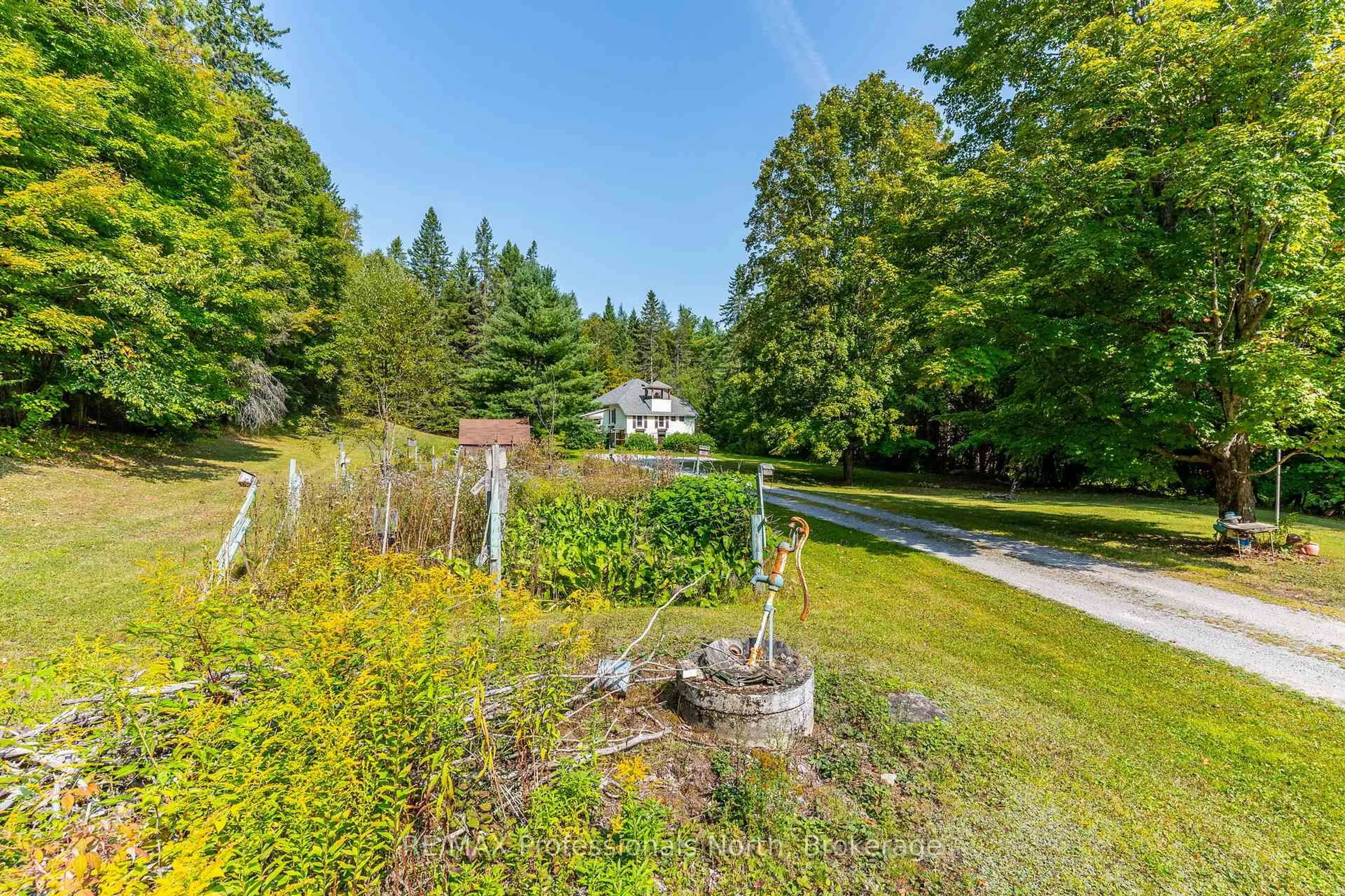 A pic from outside/outdoor area/front of a property/back of a property/a pic from drone, water/lake/river/ocean view for 9357 Highway 118 Highway, Minden Hills Ontario K0M 2K0