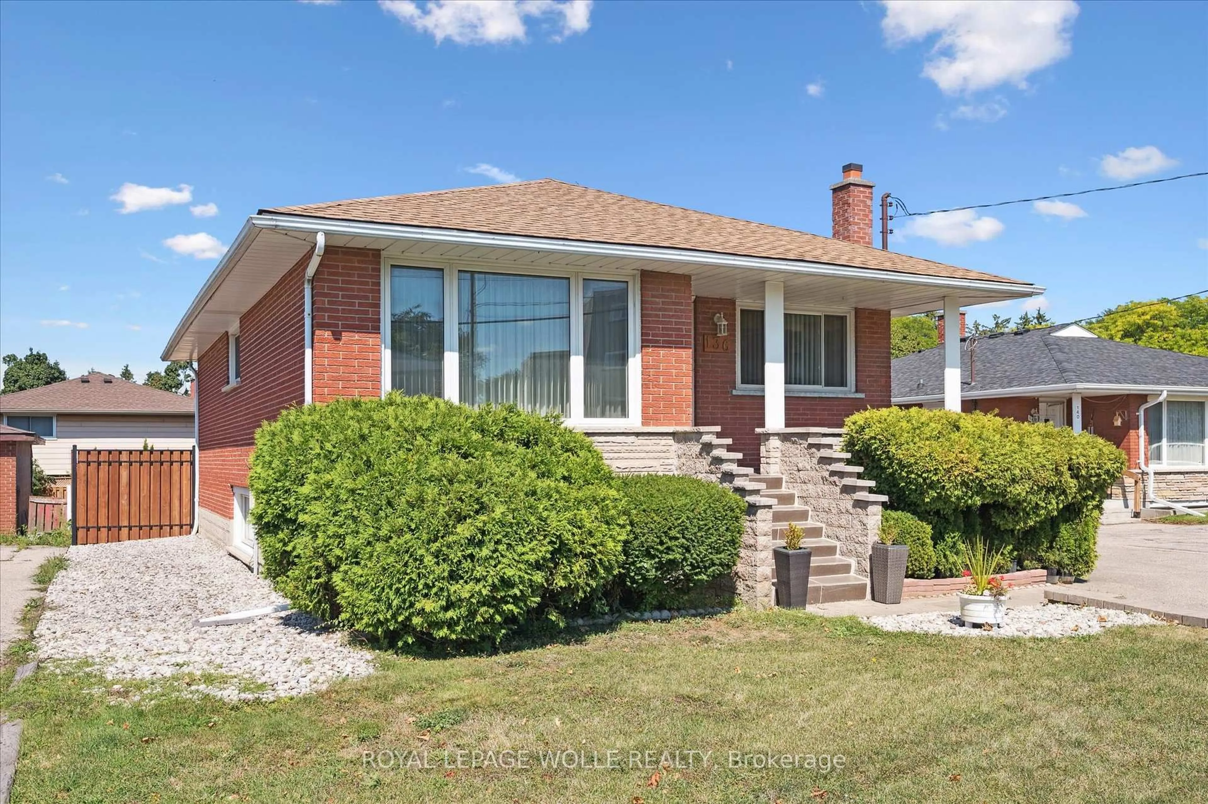 Home with brick exterior material, street for 136 Fairway Rd, Kitchener Ontario N2A 2N6