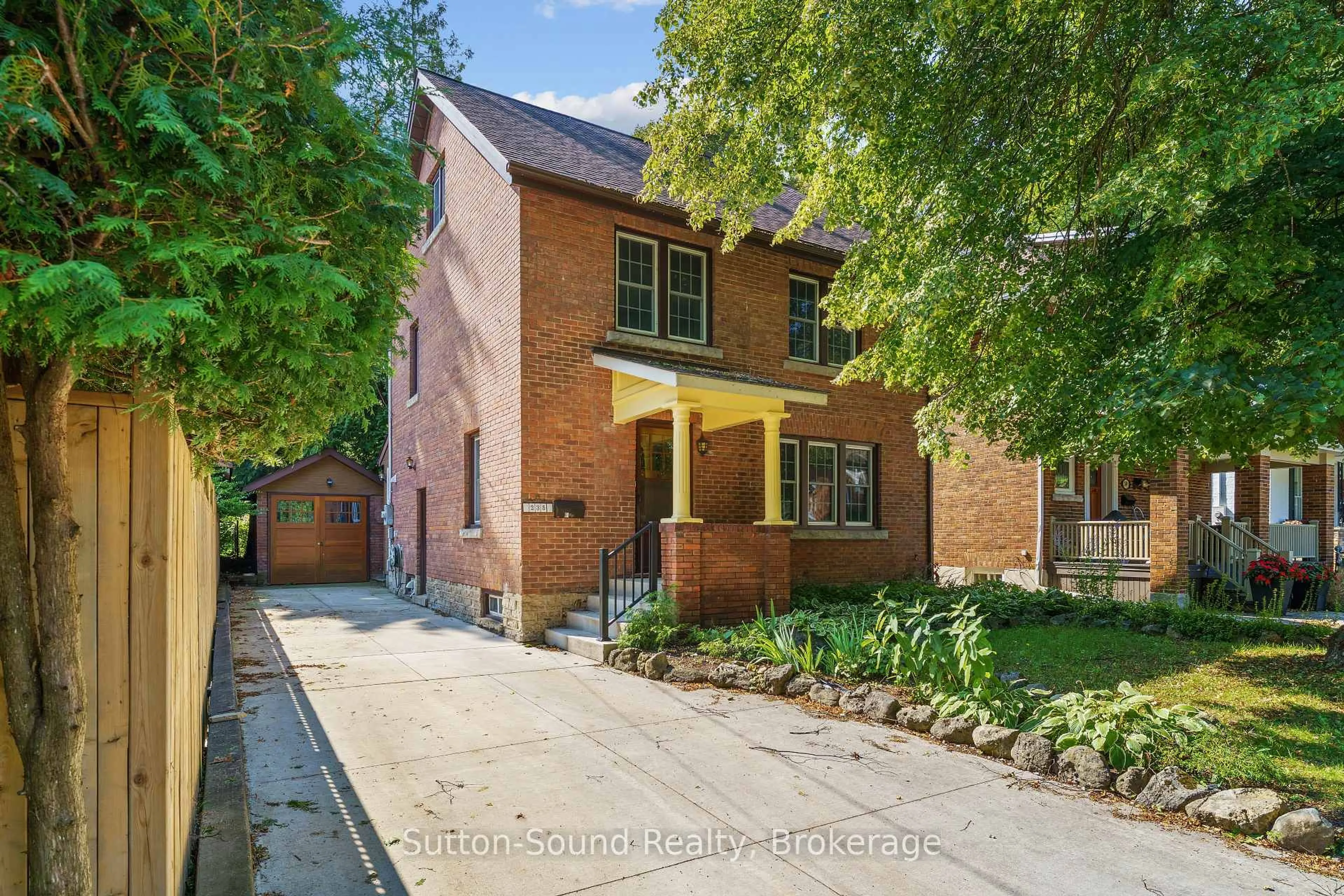 Home with brick exterior material, street for 235 7th St, Owen Sound Ontario N4K 3L3
