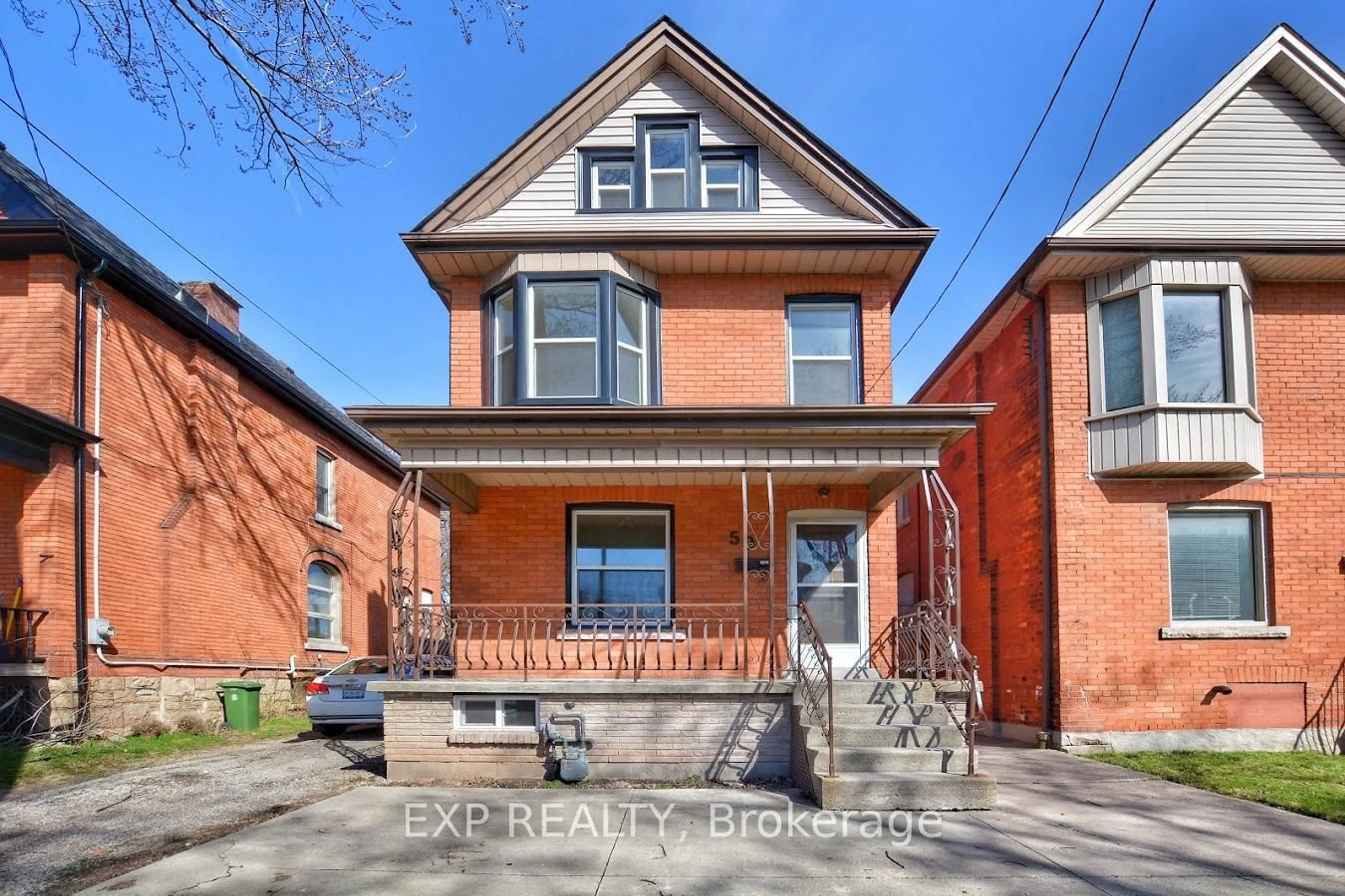 Home with brick exterior material, street for 59 Strathcona Ave, Hamilton Ontario L8P 4J1