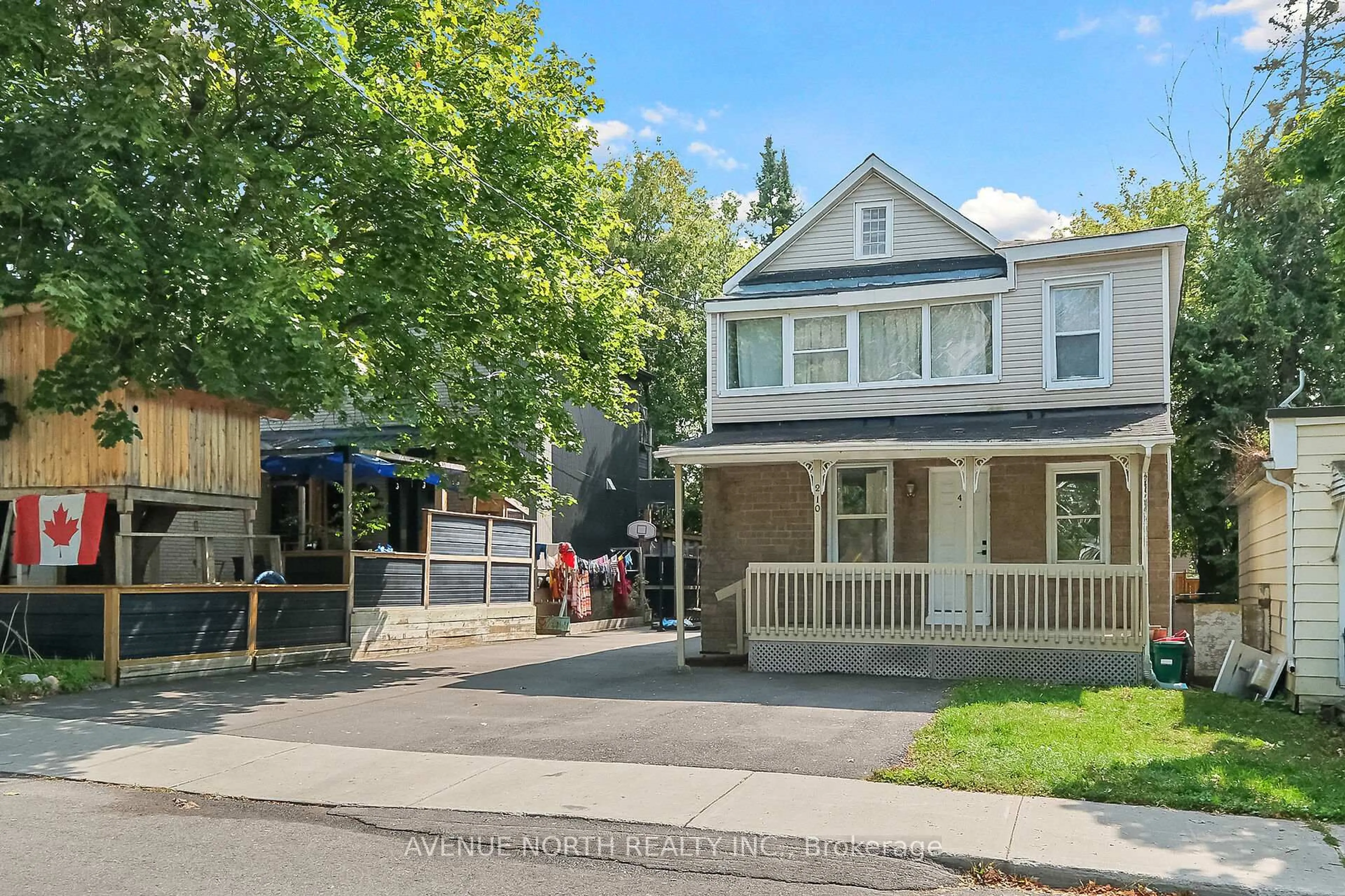 A pic from outside/outdoor area/front of a property/back of a property/a pic from drone, street for 210 Dagmar Ave, Ottawa Ontario K1L 5S9