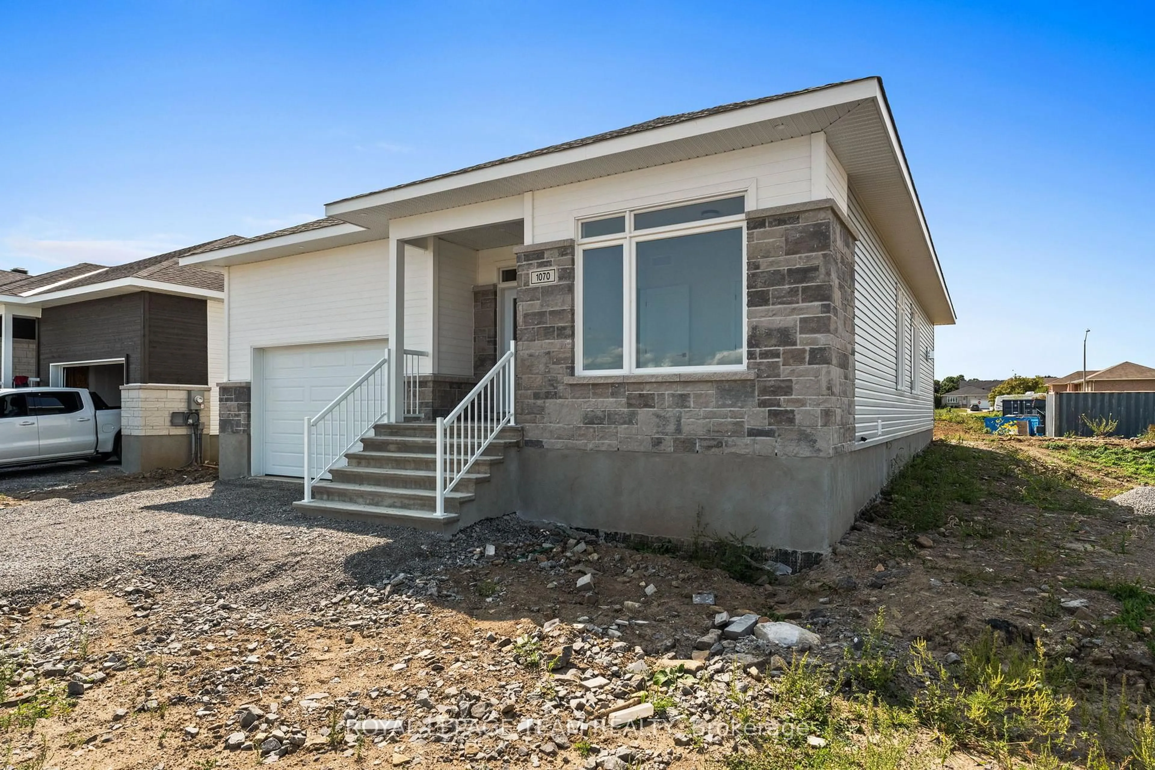 Home with vinyl exterior material, street for 1070 Turner Dr, Brockville Ontario K6V 7N1