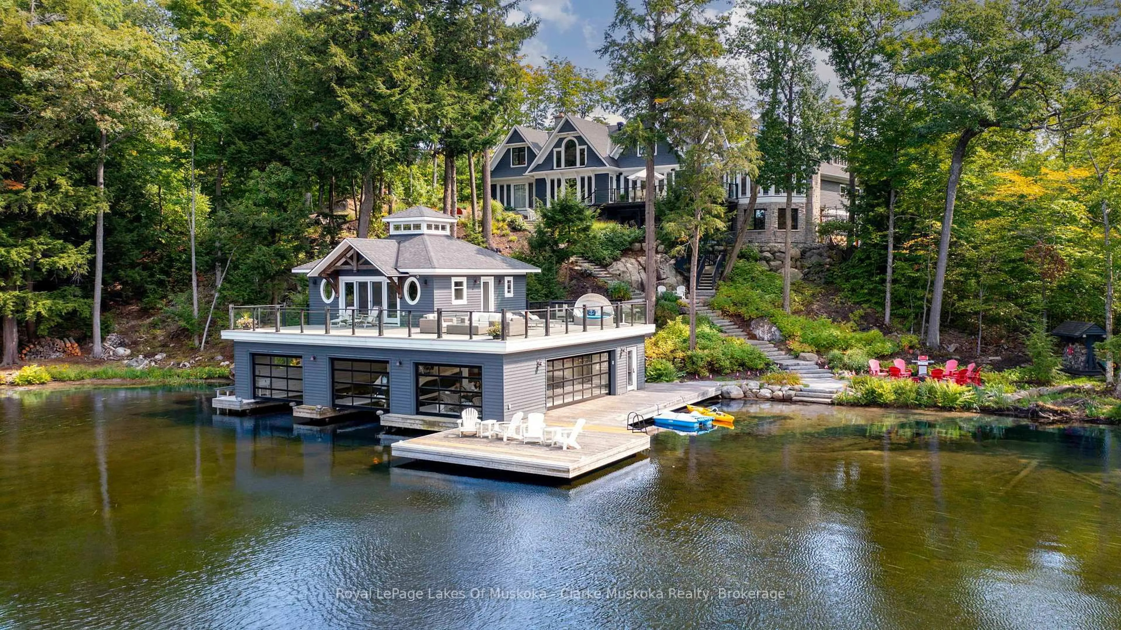 A pic from outside/outdoor area/front of a property/back of a property/a pic from drone, water/lake/river/ocean view for 1079 Trillium Rd, Muskoka Lakes Ontario P0B 1J0