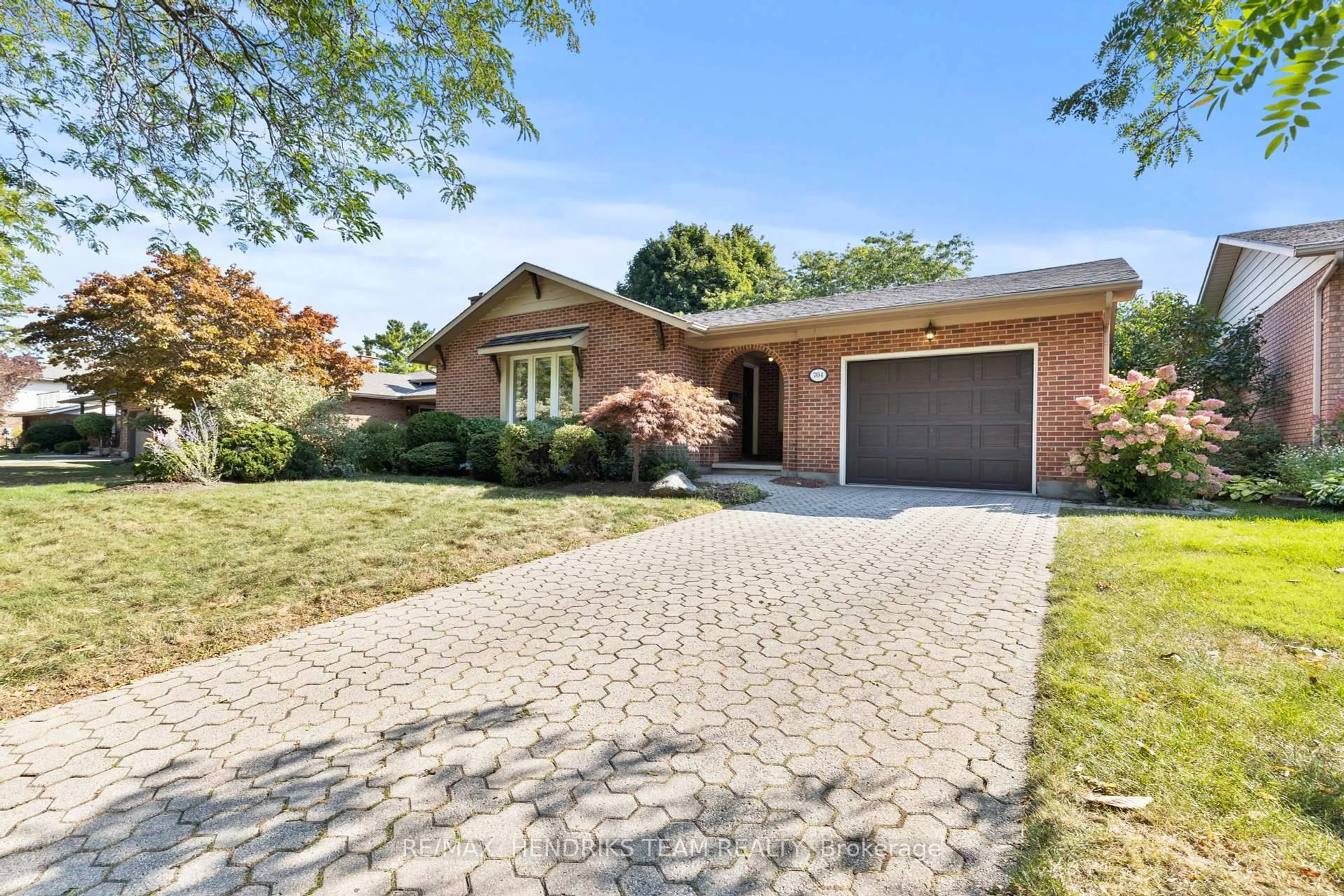 Home with brick exterior material, street for 704 Vine St, St. Catharines Ontario L2M 7L7