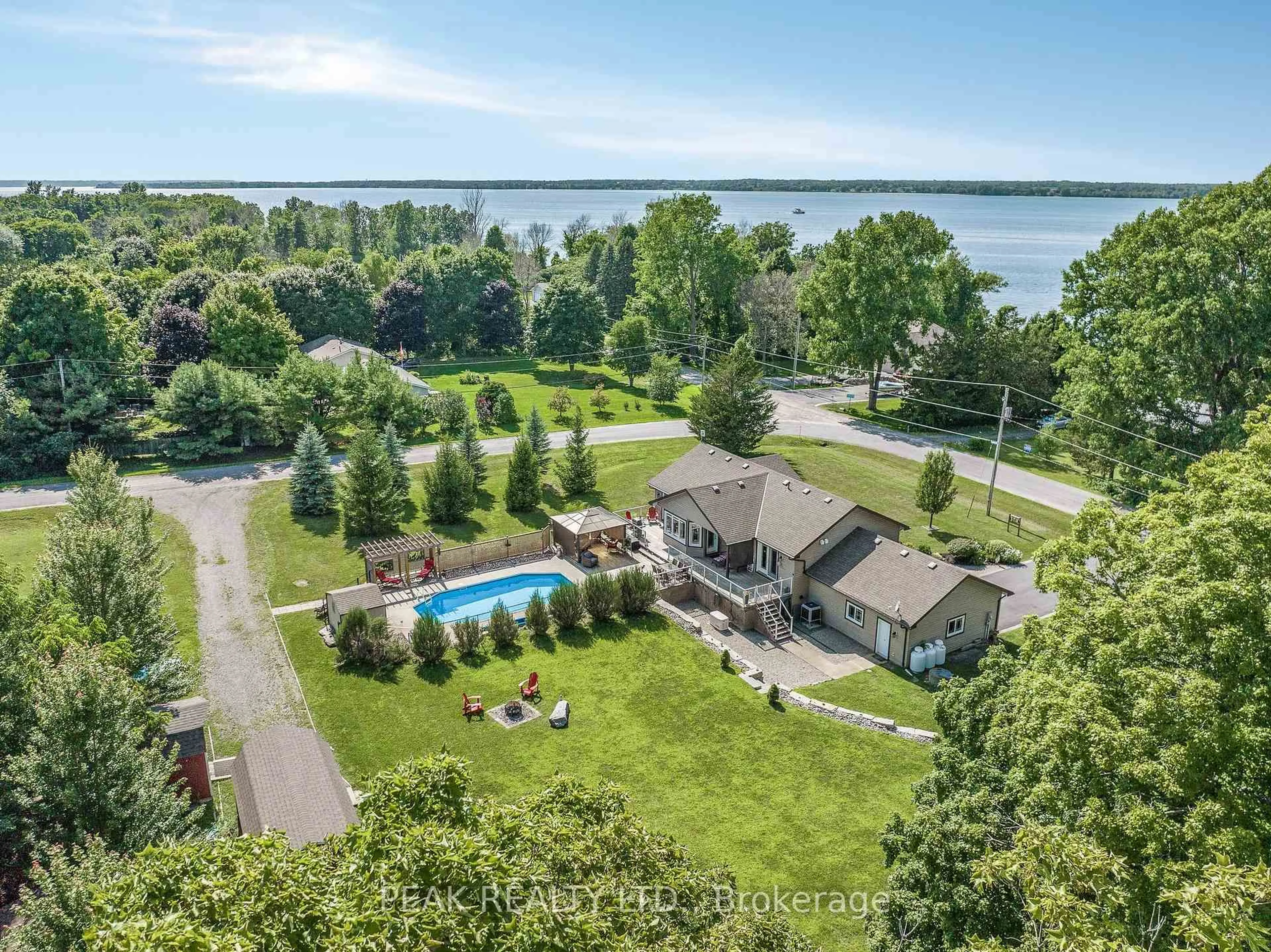 A pic from outside/outdoor area/front of a property/back of a property/a pic from drone, water/lake/river/ocean view for 116 Prinyers Cove Cres, Prince Edward County Ontario K0K 2T0