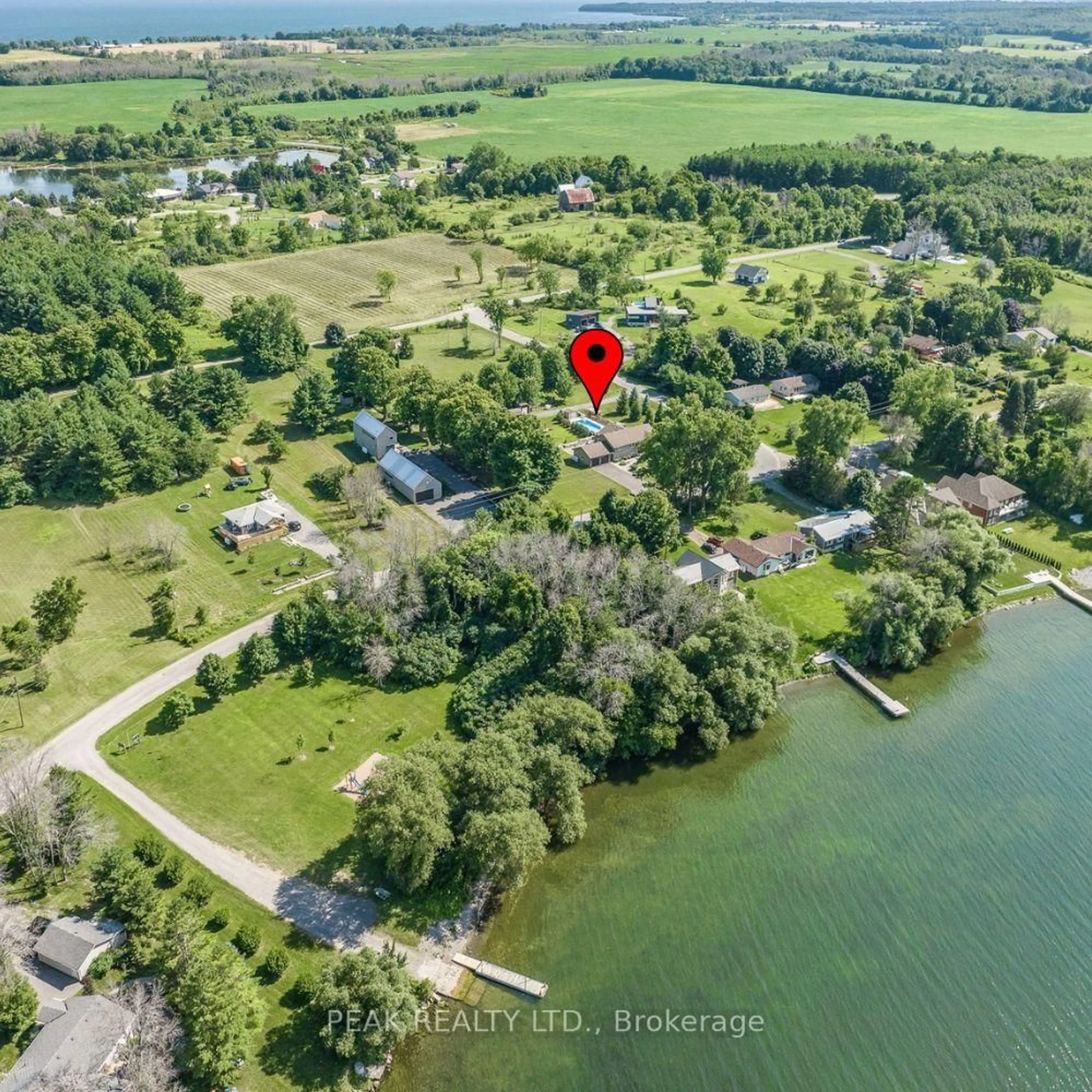 A pic from outside/outdoor area/front of a property/back of a property/a pic from drone, water/lake/river/ocean view for 116 Prinyers Cove Cres, Prince Edward County Ontario K0K 2T0