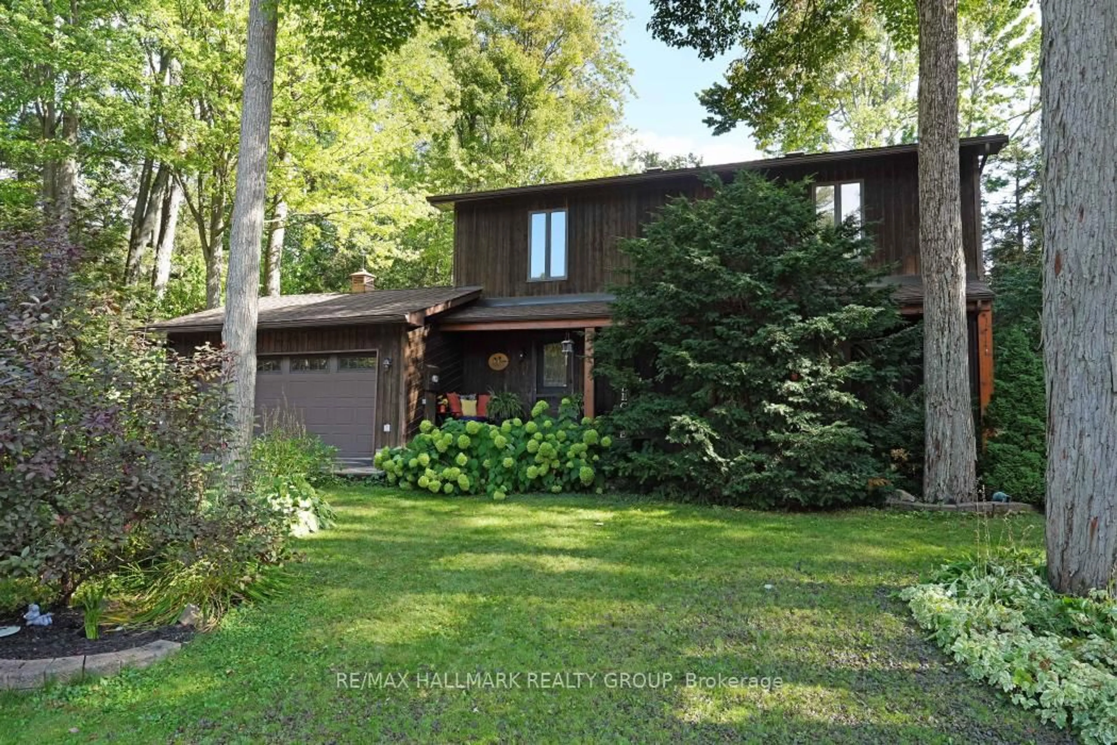 Home with brick exterior material, forest/trees view for 5498 Edgewater Dr, Ottawa Ontario K4M 1B4