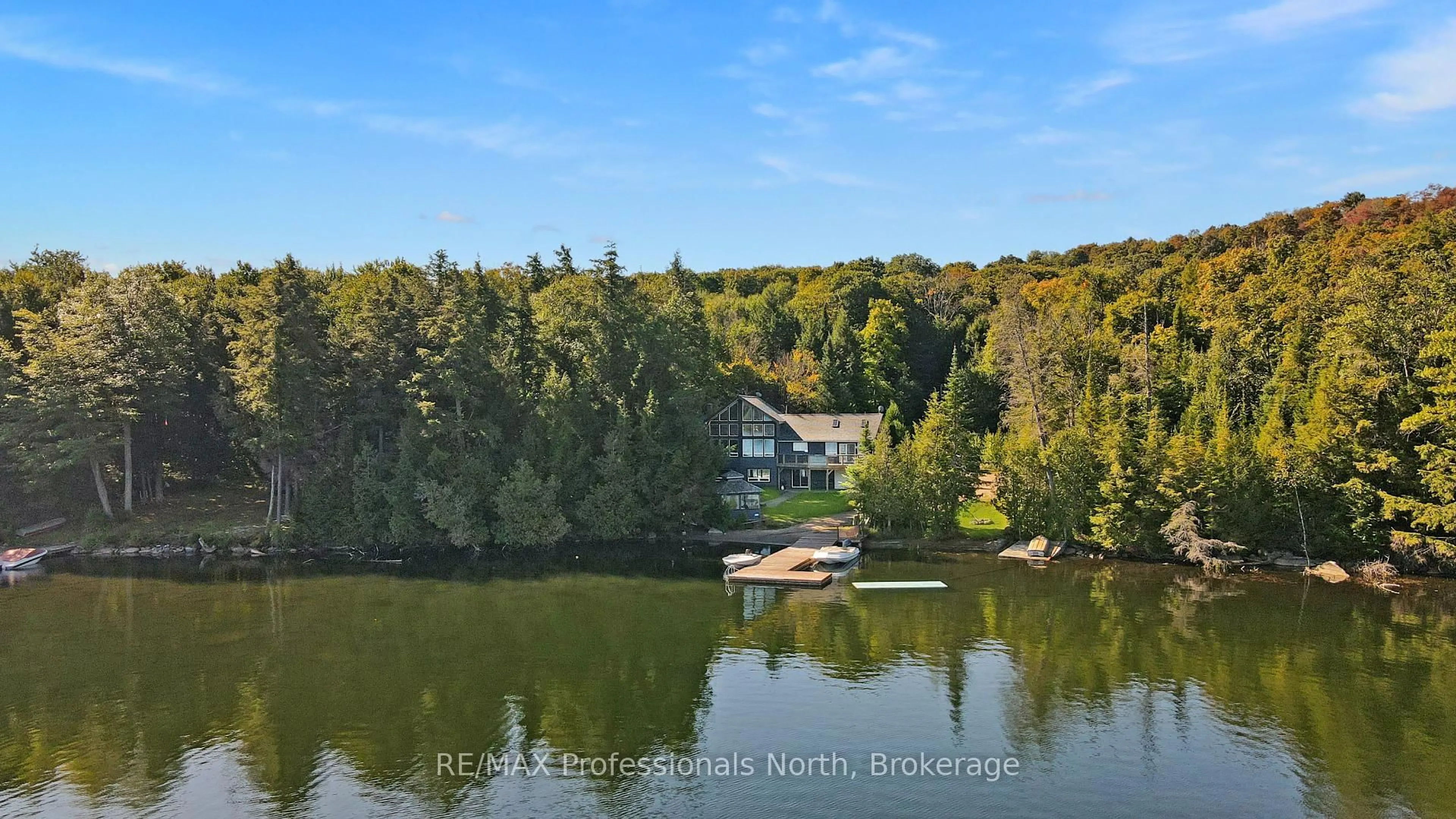 A pic from outside/outdoor area/front of a property/back of a property/a pic from drone, water/lake/river/ocean view for 1645 Allen Lake Dr, Dysart et al Ontario K0L 1X0